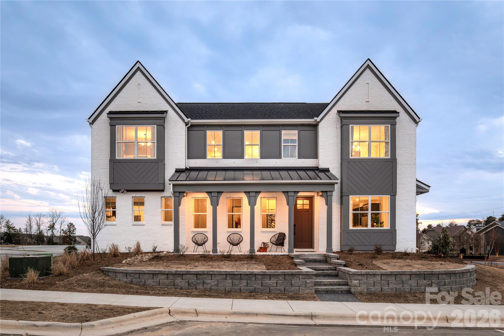 Model home. Lighting, appliances and window treatments convey. Lucere at Windell Woods is a unique, carriage home community for homeowners looking for an intimate courtyard living experience. This community features three different thoughtful home designs to choose from, with a transitional approach that fosters a sense of community. Each home includes landscape maintenance with your HOA dues.
Please note that while the Babbling Brook Lane is a public street, the shared driveway is considered private.