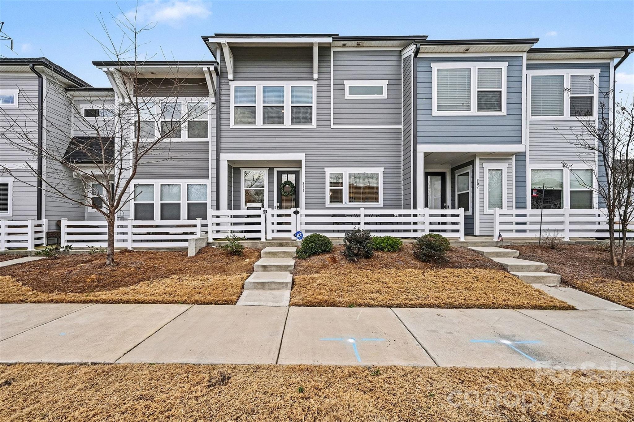 Welcome to this beautifully maintained 3-bedroom, 2.5-bath townhome in Charlotte’s highly desirable LoSo neighborhood, just steps from everything South End has to offer—top breweries, shopping, dining, and entertainment right at your doorstep. The open-concept first floor is ideal for both everyday living and entertaining, featuring updated modern appliances, a stylish kitchen with clean lines, and a cozy fireplace that anchors the living space with warmth and character. Upstairs, you’ll find a versatile loft area, a conveniently located laundry room, two secondary bedrooms, and a spacious primary suite complete with a large bedroom and an exceptionally generous closet. The home also features a 2-car garage and a front patio, perfect for relaxing, grilling, or enjoying the neighborhood atmosphere. This home blends modern comfort with an unbeatable location—minutes to Uptown Charlotte and the Airport, perfect for anyone looking to enjoy the energy of South End while living in a quieter, residential setting.