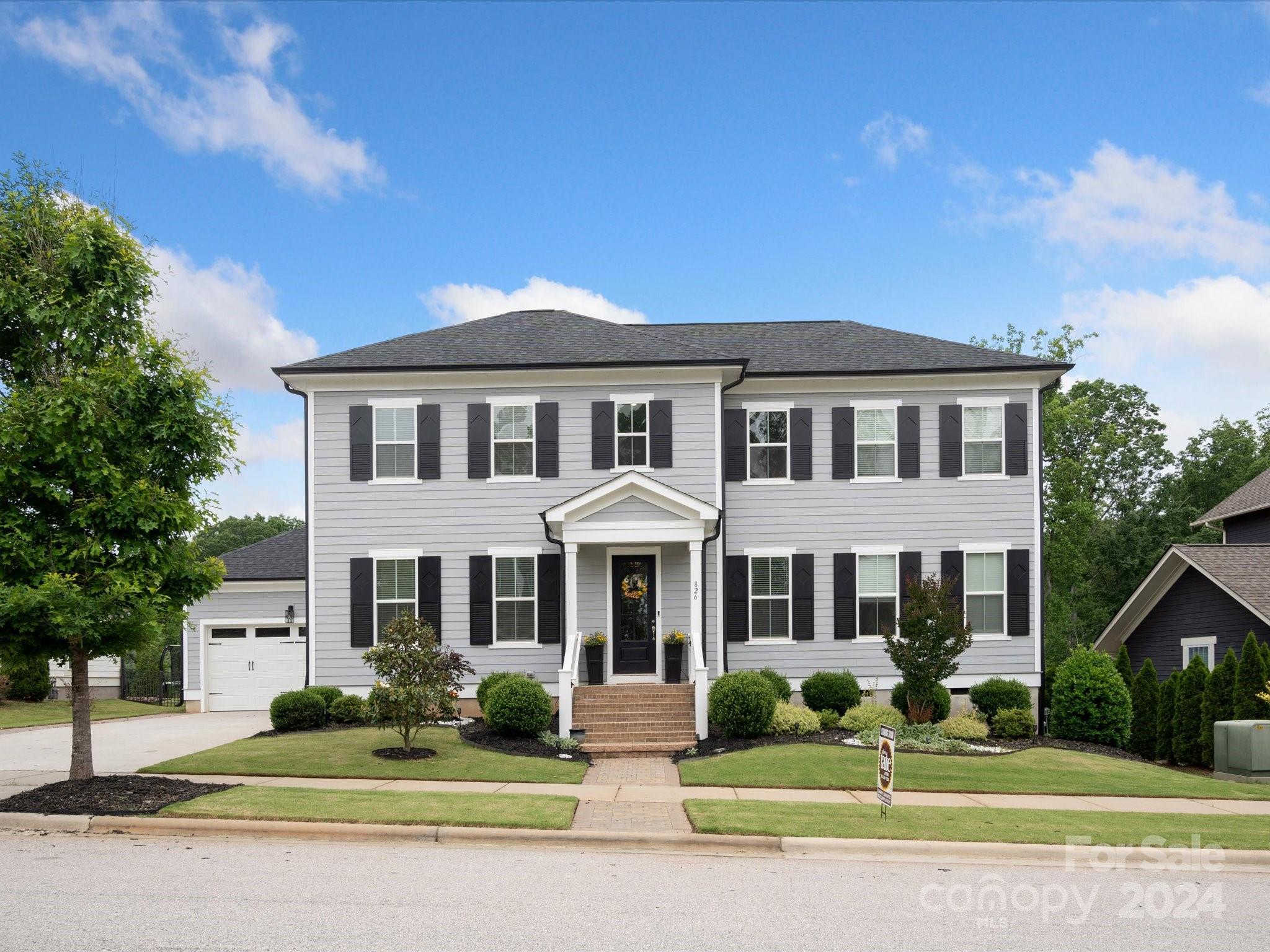Experience luxury living at its finest in this meticulously designed property. With a custom stack stone fireplace, premium hardwood floors throughout the main level and stairs, and a primary owner's retreat conveniently located on the main floor. Entertainment is elevated with a network and audio video closet, along with ceiling surround sound in the living room. Outside, an extra wide driveway with pavestones adds both convenience and curb appeal. Cat 6 jacks in every room and on exterior for corners for easy security system integration. 8 zone irrigation system for yard and mist connectors for flower beds. 67 ft crawl space for additional storage. Don't miss your opportunity to make this exceptional residence yours.