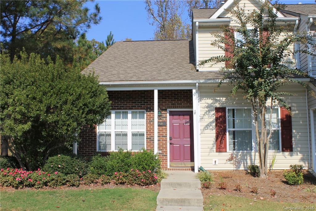 Conveniently located end unit in highly sought after Windsor Trace. 1st floor master suit located off of 2-story GR w/ FP & NEST thermostat; Spacious kitchen w/ SS appliances, cabinet roll-outs, new garbage disposal, dining nook, pantry, powder room, & sliding glass doors leading to extended deck; Hardwoods flow throughout main floor & bathrooms; 2nd floor features secondary bedrooms w/ guest bathroom; exterior features extended deck w/ wooded views, extended paver patio, & extended flower beds.