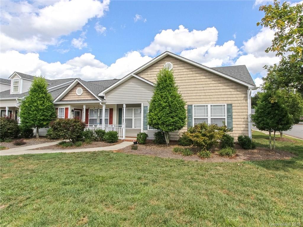 Spacious 3BR/2BA garden style condo. Open floor plan with vaulted ceiling, front porch, and patio. Conveniently located with low HOA fees. Lawn maintenance included. New Wood-Look Tile Floors throughout!