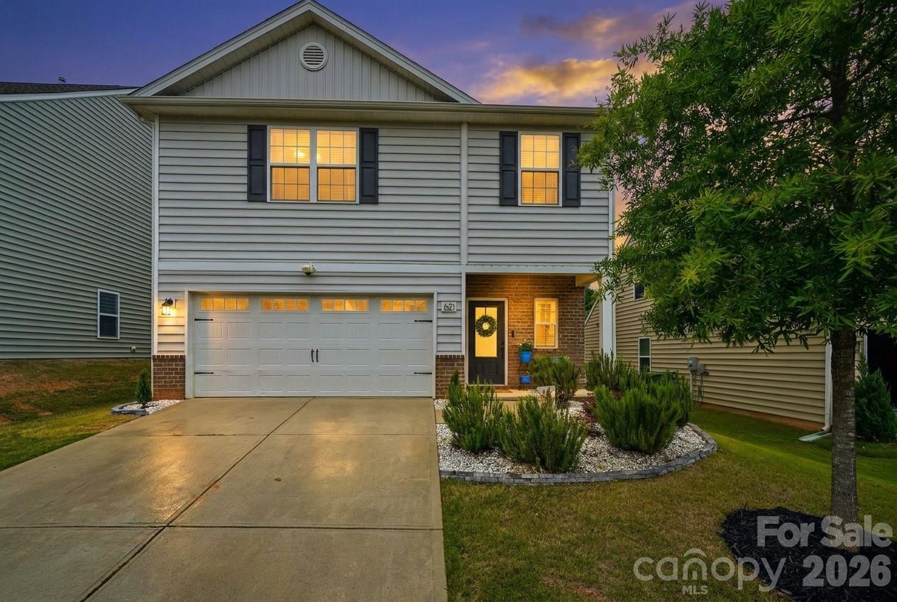 Welcome to 621 Cape Fear Street! Combine high-tech efficiency and high-end comfort. If you’ve been looking for a property that balances modern sustainability with a warm, "homey" feel, this is IT.
One of the most significant features of this home is the fully integrated energy savings. A paid and transferable Pure Black Solar panels with Enphase microinverters. The garage is finished—epoxy floors and all—and comes fully wired for your electric vehicle charger, making the home future-ready.
Inside, the home has been thoughtfully reimagined with upgrades that matter. The main living area is framed by custom cabinetry and features motorized blackout blinds in the living room, dining room, and master suite—perfect for creating the right ambiance at the touch of a button. The entire house is "smart-wired" with integrated lighting switches, and a whole-home water filtration system ensures quality from every tap.
The second level is just as impressive, with engineered hardwood floors flowing through the halls and updated tile in the bathrooms and laundry room. The master suite has been transformed into a true sanctuary, featuring a remodeled bathroom complete with heated floors—a luxury you’ll appreciate every morning. From the updated light fixtures to the refreshed powder room, every corner of this home feels intentional and upscale.
Outside of the four walls, you’re in the heart of Fort Mill’s vibrant community, where you get the benefit of a modern, efficient lifestyle without sacrificing the charm and space this neighborhood is known for. The property footprint extends about 30 feet past the current rear fence line, offering an incredible 'deck-ready' landscape. Follow the lead of neighboring homes and add a custom tier-down terrace deck to unlock an elevated, panoramic view of the lush tree canopy behind you—creating the ultimate private outdoor retreat. 
Welcome home to 621 Cape Fear.