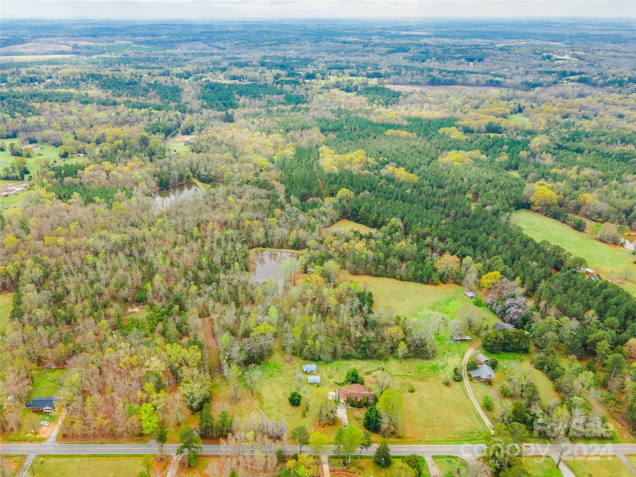 Discover the endless potential of just under 20 acres of raw land, where your imagination knows no bounds. Embrace the opportunity to build your dream home amidst sprawling greenery, creating a sanctuary that's uniquely yours with ample space for outdoor recreational activities! Serenity awaits by the tranquil pond offering a peaceful retreat to unwind and connect with the outdoors. Seize the chance to bring your vision to life on this expansive canvas of possibilities.