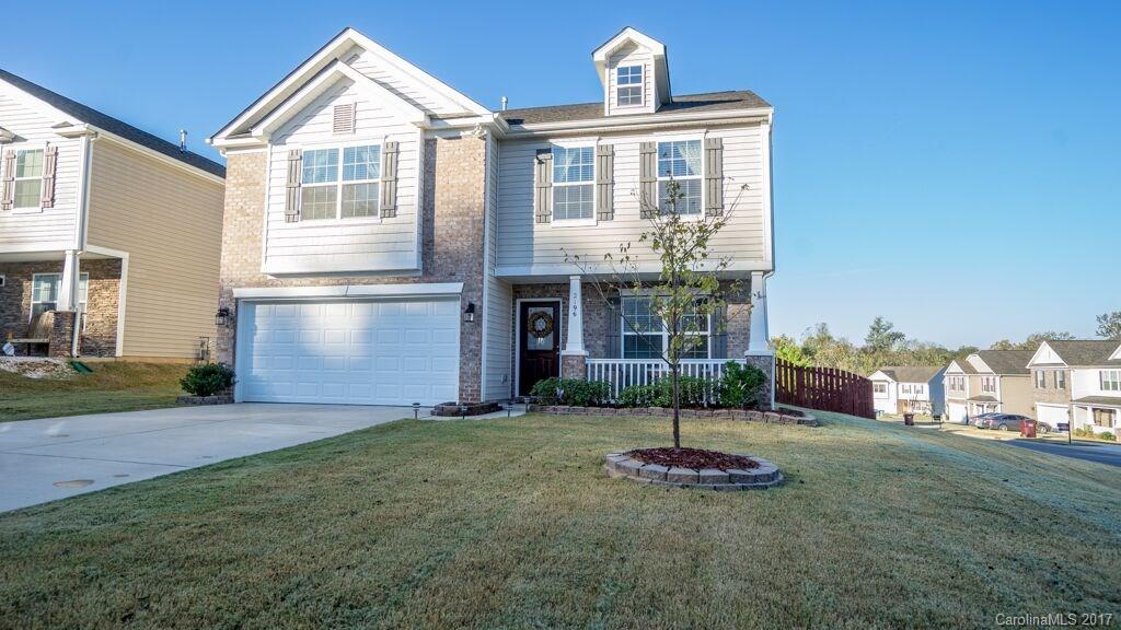 Like New Gorgeous Home with $10,000 upgraded hardwoods. Spacious family room w/fireplace & open floor plan. Kitchen has gorgeous backsplash & lovely eating area. Large backyard has Pergola, landscaping stones, outdoor entertaining & playground area. Nice private corner lot with FENCED backyard, the backyard is sloped.  The chandeliers in the bedrooms do NOT convey.  Blinds will convey, but not curtains. Swingset can remain with acceptable offer. Sellers are motivated and welcome all offers.