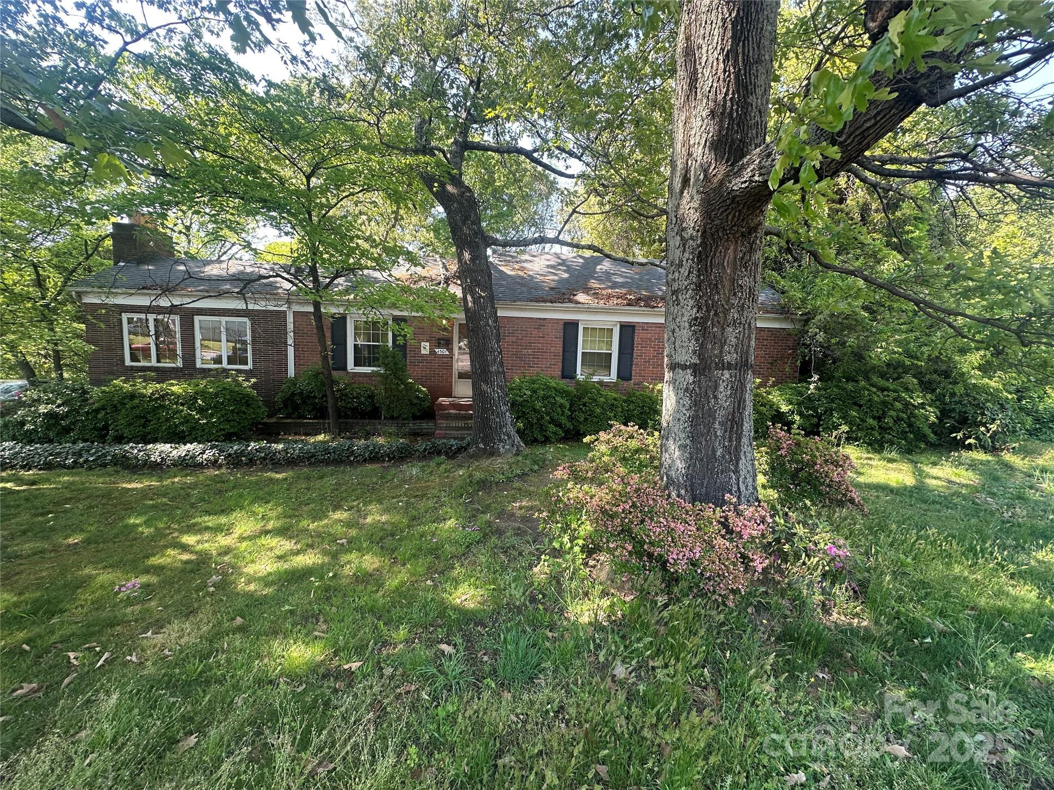 Don't miss this rare opportunity!!This is an ideal property for investors and developers.  Located near the busy intersection of The Plaza and Eastway, this half acre, mostly flat lot is perfect for development.  With the high volume of street traffic and recent development in this area, this property will not last.  This property is intended to be sold as a lot.  The home is considered a teardown and is sold as-is.  It is the buyer's responsibility to demolish the structure.