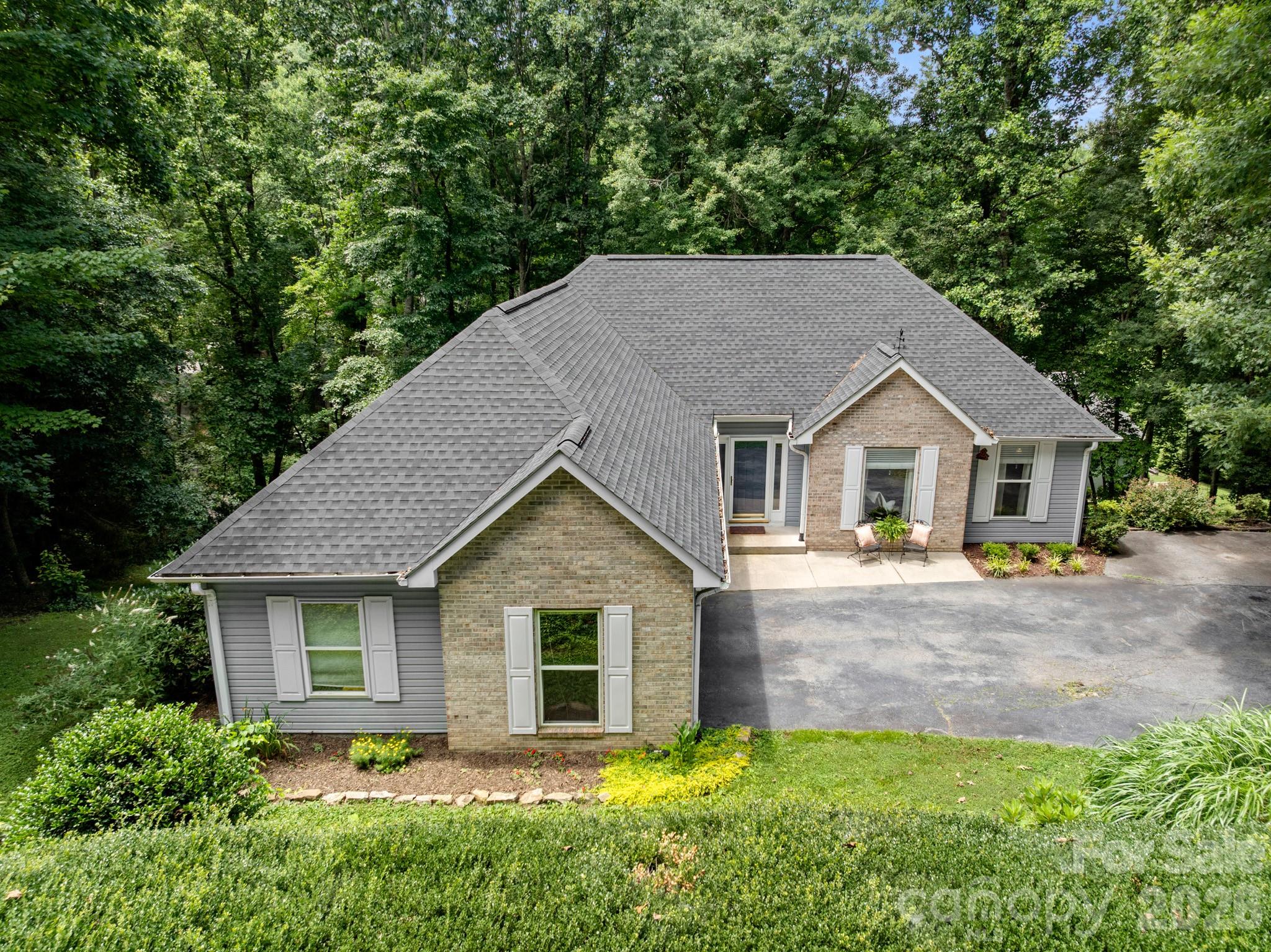 Welcome to the Estates of Salisbury… where suburban elegance meets mountain serenity!

Now offered with a $25,000 price adjustment, this move-in-ready home offers more space than meets the eye with 2,546 thoughtfully designed square feet and an abundance of storage.

Nestled on a desirable double lot, this charming 3-bedroom, 3-full-bath home combines comfort, versatility, and exceptional outdoor living. The fenced backyard provides peace of mind for pet owners, creating a safe and secure space for four-legged family members to play, explore, and enjoy the outdoors. It also offers the perfect setting for gardening, entertaining, or simply unwinding in your own private retreat.

Inside, the main level features a welcoming living room with gas logs, two bedrooms, two full baths, and a convenient two-car garage. Enjoy morning coffee on the screened sun porch or spend the evening relaxing on the open deck while taking in the peaceful surroundings.

The fully finished lower level offers outstanding flexibility with its own separate entrance, making it ideal for guests, multi-generational living, a home office, hobby space, or extended stays. This level includes an additional bedroom, full bath, bonus room, spacious living area, and access to a private deck, creating a comfortable and private retreat within the home.

Located in a well-maintained community with a modest $75/month HOA fee that includes water, this property delivers the perfect blend of space, convenience, and mountain living. Whether you're looking for room to spread out, a welcoming place to entertain, or a secure yard where pets can roam freely, this home offers a lifestyle that's easy to love.
