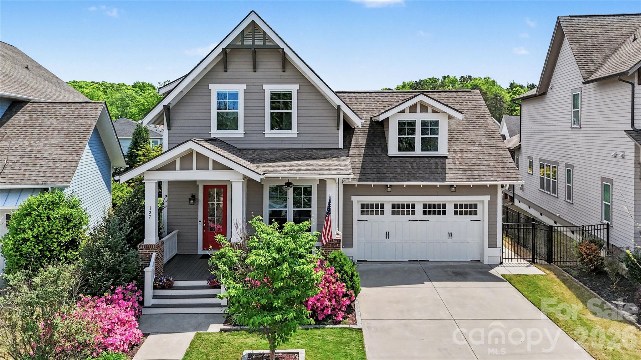 Welcome to your dream home in the amenity-rich neighborhood of Masons Bend! This pristine 4-bedroom, 3.5-bath residence is a masterpiece of custom craftsmanship and modern upgrades. Step into a light-filled living room that effortlessly flows into a spacious dining area and a chef’s kitchen, complete with an oversized granite island, top-of-the-line GE Cafe stainless steel appliances, custom cabinetry and 2 pantries—perfect for entertaining! The main floor features a tranquil primary suite with a spa-like bath, soaking tub, oversized shower, and a generous walk-in closet. A versatile office space, stylish half bath for guests, huge laundry room and drop zone complete this level. Upstairs, discover three spacious bedrooms with smart storage solutions, two beautifully appointed full bathrooms with tile floors and granite countertops, and a versatile loft area ideal for game nights or a cozy movie experience. Outside, the expansive covered back porch and large patio overlook a professionally landscaped and fully fenced backyard, perfect for outdoor gatherings. This home is loaded with upgrades including more than 400 sq ft of easily accessible unfinished storage and a finished hobby room upstairs. Shows like a model and is conveniently located near schools, I-77, and so much more.