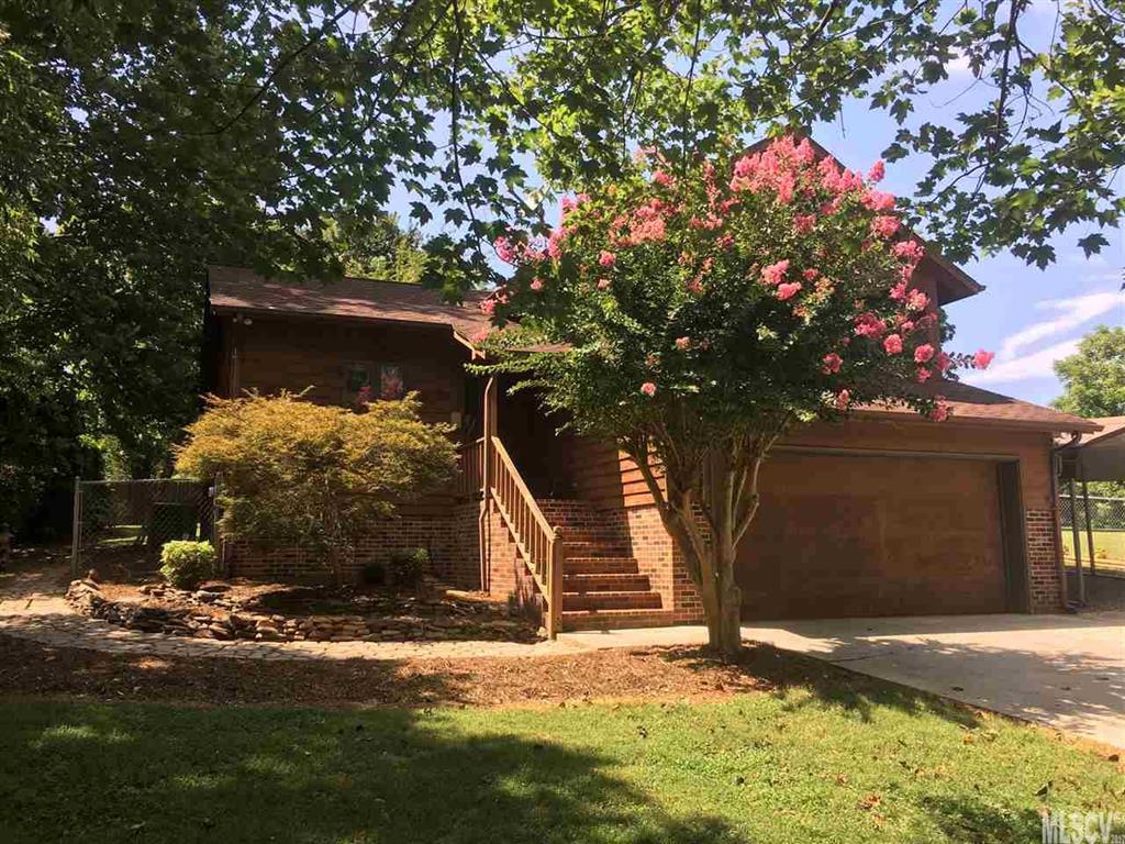 A fantastic find home close to everything yet secluded on quiet street.  Truly deceiving amount of square footage with double garage and outbuilding with power. Fenced back yard and beautifully landscaped.  You must see to believe home.