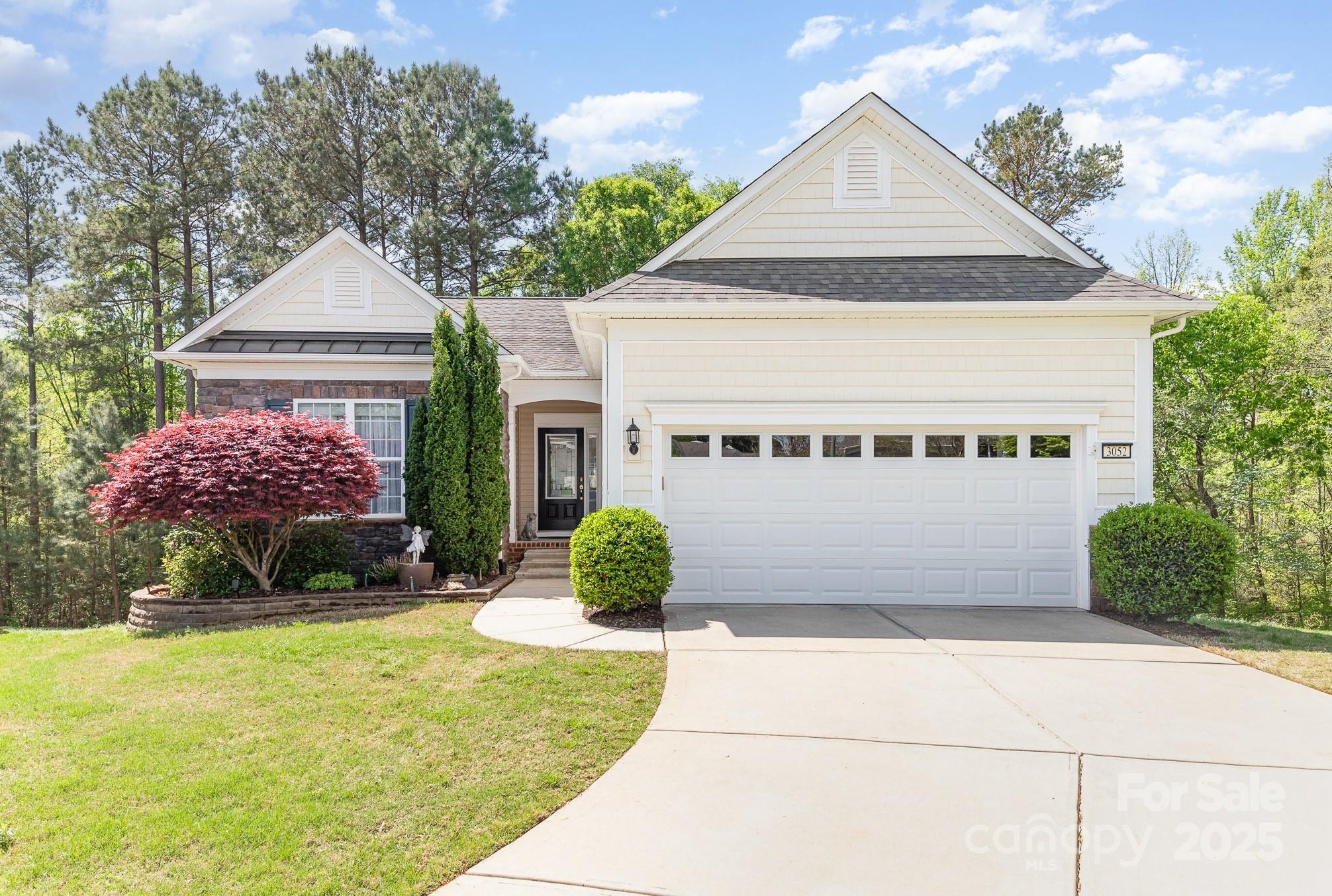 Come and enjoy resort-like living in amenity-rich Sun City Carolina Lakes. This beautiful 3BR/3BA Copper Ridge basement home is move-in ready. Main floor features a large great room, kitchen w/gas range, SS appliances, dining area, bright & beautiful sunroom, flex room (office/study/craft room), primary bedroom w/custom shower in bathroom, BR 2 & bathroom. The spacious basement has a large great room, BR 3 w/sitting area, bathroom, large flex room, and utility room w/workbench storage space. Garage features full house surge protector, custom shelving, and electric car charging station. Fenced area ideal for pet. Great view of woods from upper level deck and patio off of basement. Newly landscaped backyard. Come and enjoy all the beautiful amenities & diverse activities this premier 55+ community has to offer! Live the dream! Sun City Carolina Lakes has a public golf course and is in close proximity to shopping, restaurants, medical facilities, recreation areas, entertainment, & more!