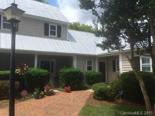 Garden level walk up townhouse in the heart of Dilworth! Hardwood flooring adorns the living areas and foyer while carpet is in each bedroom. The living room has built in shelving, fireplace, vaulted ceiling and tons of natural light. The kitchen looks into the living room and is complete with abundant cabinetry and white appliances. The master has great walk in closet space and bay window perfect for reading or morning coffee. Lush, private garden in enclosed patio.