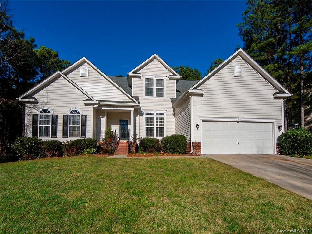 This woods view, lake community home with FREE boat storage has new paint & brand new floors w/plenty of places to entertain including a fully wired screened in porch w/hot tub. Take in a game of pool in the oversized bonus room or cozy up by the fire. Loads of storage w/2 attics. In summer months this neighborhood is full of activity: including a pool w/a cabana facility, grills, & picnic & private beach area, plus a picnic pavilion w/fire pit/grills, & a lakeside boardwalk w/rocking benches.