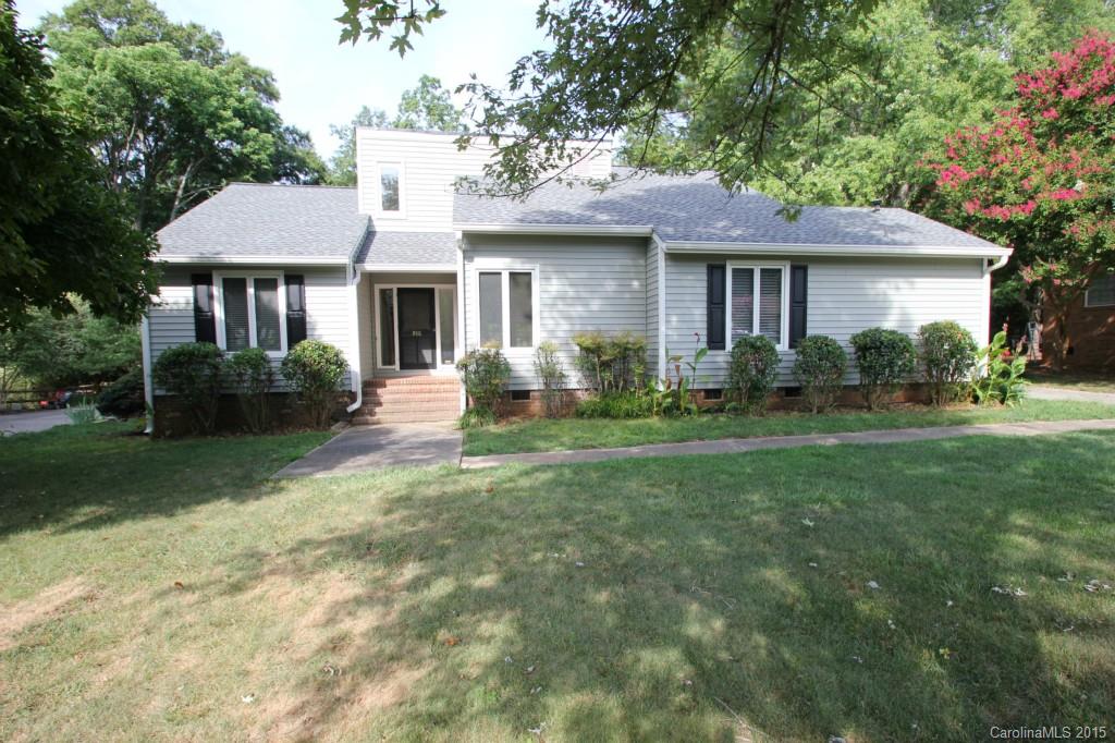 MATTHEWS!  Walk from this great 3BR 2BA Ranch style home to Beautiful Downtown Matthews and to 4 Mile Creek Park and walking trails!  Nice sized level lot with oversized driveway!  Side entry to laundry and kitchen is very cute and you will love the large cathedral ceiling and tall fireplace!  Large Deck for entertaining over looking a very private back yard!  Roof and siding replaced in 2010, Hot Water Heater in 2013 and HVAC in 2005!