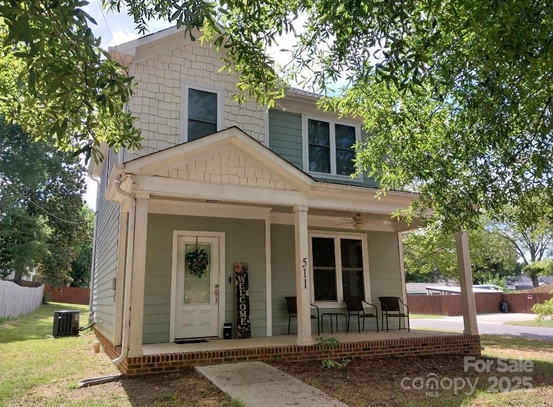 Priced to sell Quickly! Welcome to this practically new, two-story, turn-of-the-century style home, perfectly situated in the heart of the historic district. Boasting a side driveway and a spacious backyard, this residence is ideal for both entertaining and everyday living. The exterior is a nod to the past with its Queen Anne-inspired design, complete with a full front covered porch — perfect for enjoying your morning coffee or unwinding in the evening. Step inside to discover an open floor plan that seamlessly connects the living, dining, and kitchen areas. The well-designed kitchen features beautiful granite countertops, elegant white cabinets, and sleek stainless steel appliances, creating a perfect space for culinary adventures. Retreat to the primary bedroom, which offers a private ensuite, providing a luxurious escape at the end of the day. With its unique blend of historic charm and modern amenities, this home is a rare find in a desirable historical location. Don’t miss the opportunity to make this delightful property your own!