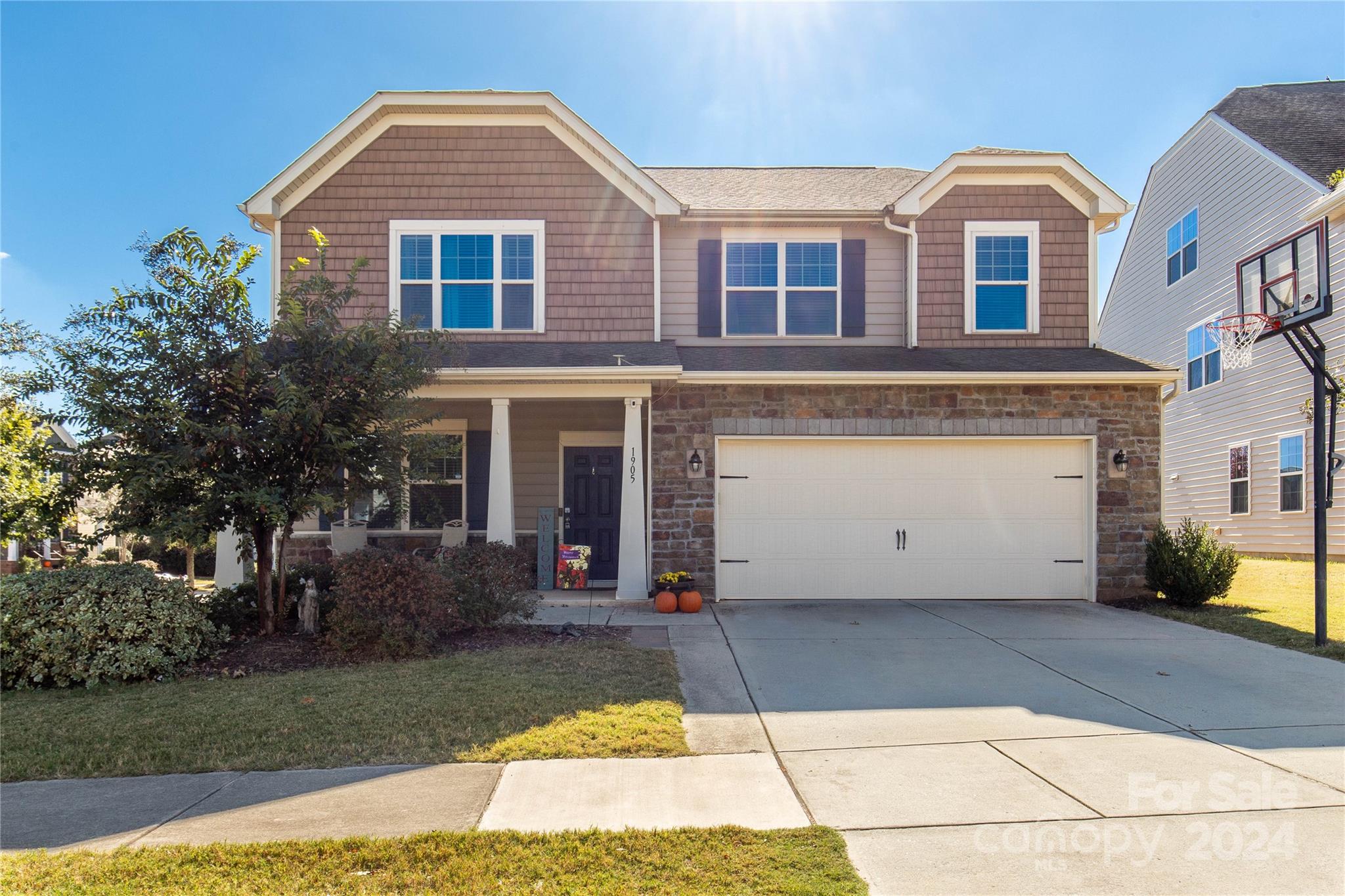 Welcome to Waterside at the Catawba!  This gorgeous home is situated on a corner lot with a terrific yard! You'll feel welcomed the moment you walk into the home where you'll find an office space with french doors perfect for working from home, hobbies, or an extra relaxation space.  The open living area has a fireplace in the family room for cool evenings, formal dining area for gatherings, and an eat-in kitchen complete with an island and 5 burner gas stove that the cook of the home is sure to love!    Upstairs is a loft for an extra living space, large primary bedroom suite with en suite bathroom, three additional large bedrooms, full bathroom, and laundry room.  Sit on your back patio in the evenings with a pergola for shade.   The community features a great community center, outdoor pool, tennis courts and more!