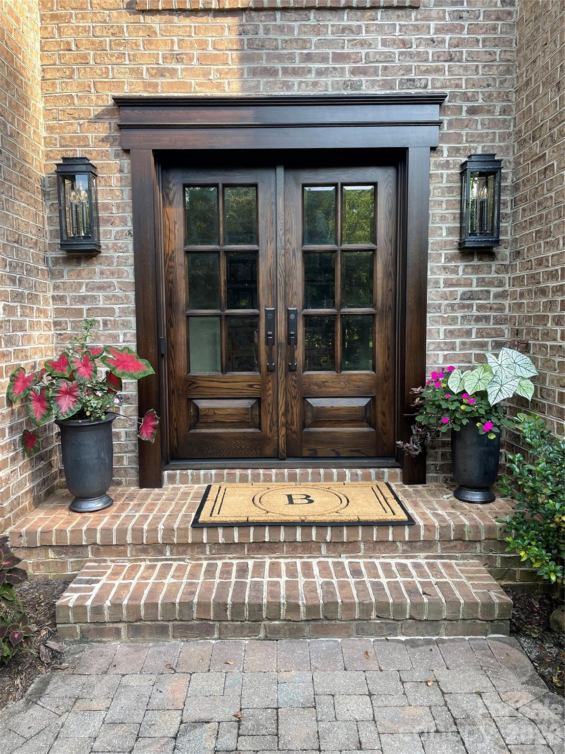 Timeless elegance meets modern luxury in this classic brick Colonial, beautifully enhanced with high-end upgrades and thoughtful design throughout. Built in 1990 and surrounded by mature landscaping, the home offers exceptional curb appeal, highlighted by a stunning custom front door crafted by Appalachian Woodworks and new windows throughout.
Inside, freshly refinished wood floors lead you through a gracious layout anchored by a gourmet kitchen featuring an extra-large island—perfect for gatherings, everyday living, and entertaining. The main floor primary suite is a true retreat, complete with a spa-like bathroom boasting heated floors and luxurious finishes.
The finished basement expands the living space with a mini kitchen, full bath, media area, and abundant storage and workshop space—ideal for entertaining, hobbies, or multigenerational living.
Upstairs, you’ll find four generously sized bedrooms. Two share a Jack-and-Jill bath, while the remaining two are served by a well-appointed hall bath, offering comfort and flexibility for family and guests alike.
Step outside to the private backyard oasis featuring an outdoor kitchen and pergola, perfect for al fresco dining and relaxed evenings surrounded by lush, established landscaping.
A perfect blend of classic architecture and modern comfort, this exceptional home is ready to be the backdrop for years of cherished family memories.