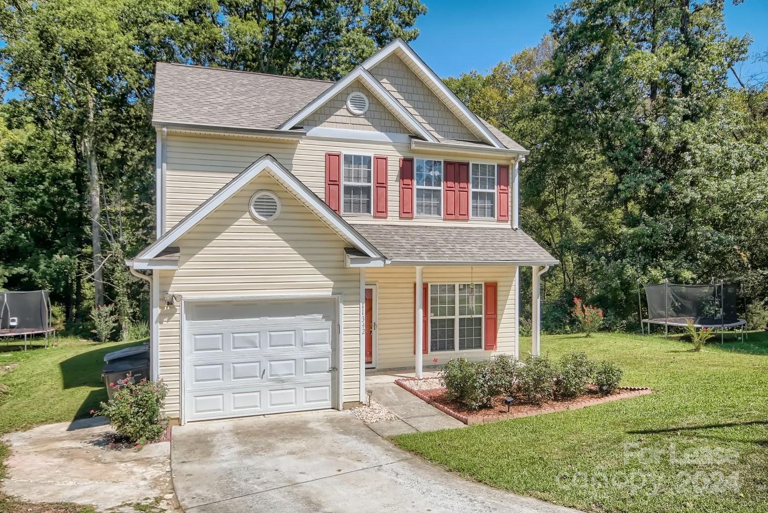 Convenient Harrisburg NC Location, Convenient to I-485 and many shopping and dining options. 4 bedroom, 2.5-bathroom home with breezy open floor plan.  The chef's kitchen features white cabinetry, stainless steel appliances, and beautiful countertops.  Roomy living areas with vaulted ceilings allow for lots of natural light.  Spacious primary bedroom with a stunning updated ensuite bathroom make this the perfect place to call home.  Outdoor amenities include a beautiful backyard perfect for outdoor entertainment on the patio.
Schedule a tour today!