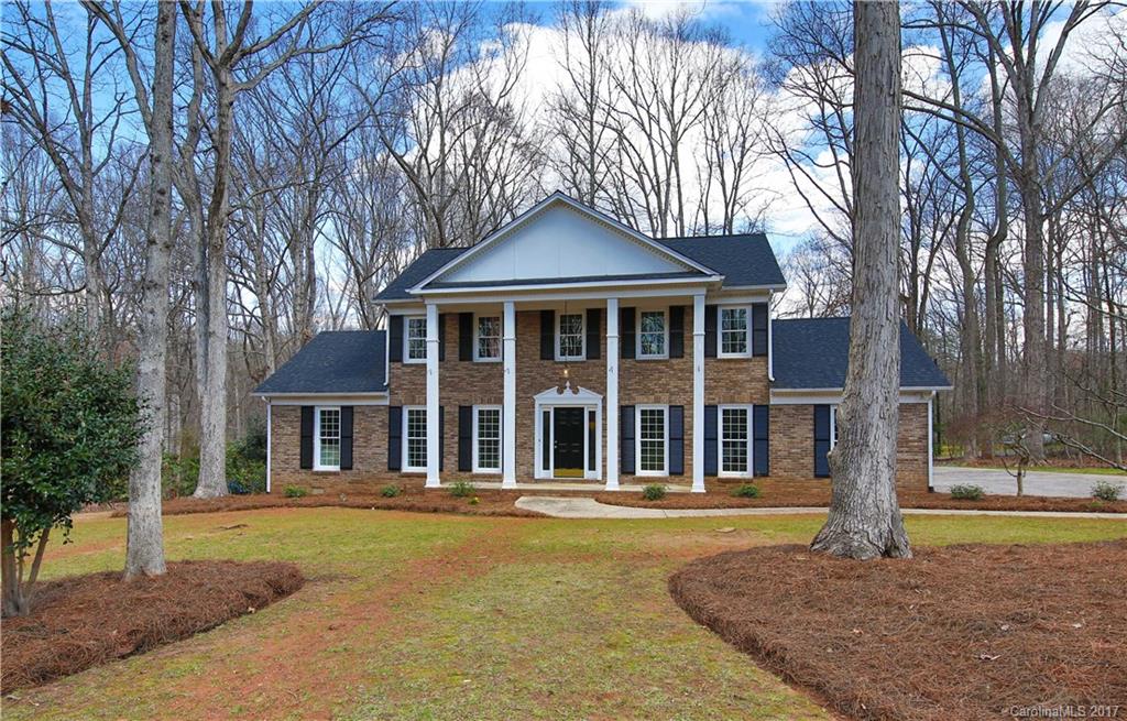 Southern Charmer!  Set outside your backyard oasis sipping wine and enjoying your new outdoor fireplace.  Rock chair front porch.  Granite in kitchen and all baths.  New flooring, stainless steel appliances, freshly painted interior, formal living room, dinning room and great room with fireplace.  Master bedroom with 2 walk in closets, tile shower and double vanities.