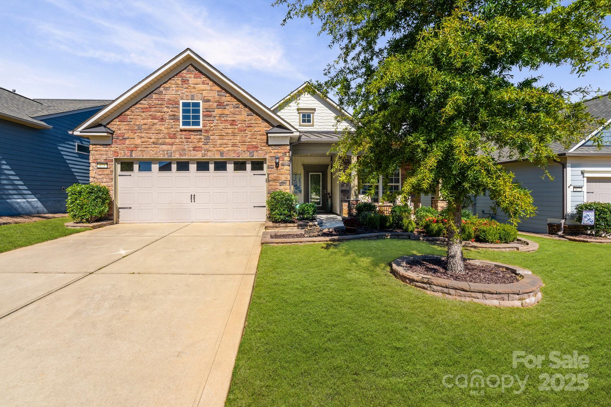 NEW PRICE - $619,000 -  Martin Ray - you won't want to miss seeing this meticulously maintained 2 BR, 2 Bath ranch.  Open concept living encourages indoor / outdoor entertaining.  Private back yard featuring a covered lanai and large paver patio.  Upgraded Kitchen, stainless steel appliances - 2 year old GE refrigerator included - gas cooktop - raised dishwasher. Coffee nook.  Butler's Pantry with large walk-in Pantry.  Oversized island with seating and pendant lighting open to the Dining Area and Great Room where you will enjoy the stone, gas fireplace with raised hearth.  Laundry Room with cabinets - washer / dryer included.  Office / Flex Room with French Doors.  Primary bedroom with large walk-in closet.  Primary bath has 3' x 8' zero entry spa-like shower with water fall head.  The Drop Zone area leads to your large 2 car + tandem (for golf cart or storage) garage.  Professionally landscaped.  5 zone Rainbird sprinkler system with separate meter and WiFi controller.  Drip lines for shrubbery beds.  Lawn maintenance included. Tons of amenities.  Full time activities director.  Indoor / outdoor pools and hot tubs. 8 lit pickleball courts, 4 lit clay tennis courts, dog park, playground, fitness center.