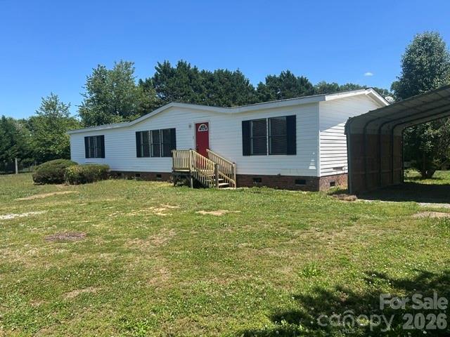 SELLER IS OFFERING $7,000 credit for New SHINGLES/Roof with acceptable offer! Home is priced to sell! This 3 bedroom 2 bath home has been freshly painted and has new carpet installed! It is    located in a country setting. (no city taxes) This property would be a great rental investment or used as a primary home. The home offers a very large living room and dining area. Home also features split bedroom plan. Primary bedroom has garden tub and separate shower. There is also a laundry room. Almost one acre comes with this property.