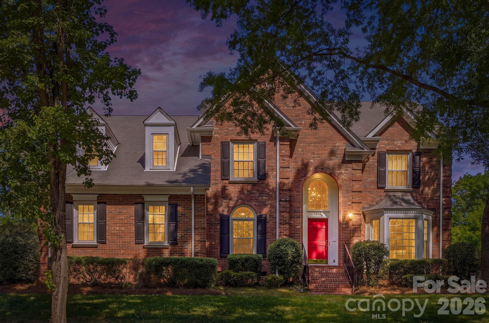Welcome to 7006 Darnley Place, a beautifully maintained brick two-story home in the popular Chadwyck Farms community. As you enter there is a two-story foyer flanked by a private home office and living room. The main level also features a dining room, laundry room, and a spacious kitchen complete with a large granite island, gas range, and walk-in pantry—perfect for everyday living and entertaining. The two-story great room with fireplace offers abundant natural light and opens into the kitchen area. Upstairs, the oversized primary suite includes a walk-in closet, dual vanities, and a large shower, along with two additional bedrooms and a versatile bonus room that can serve as a fourth bedroom. Dual staircases add convenience and character. Enjoy outdoor living on the covered back porch overlooking a large, fenced backyard. The attached garage features a newly finished epoxy floor.