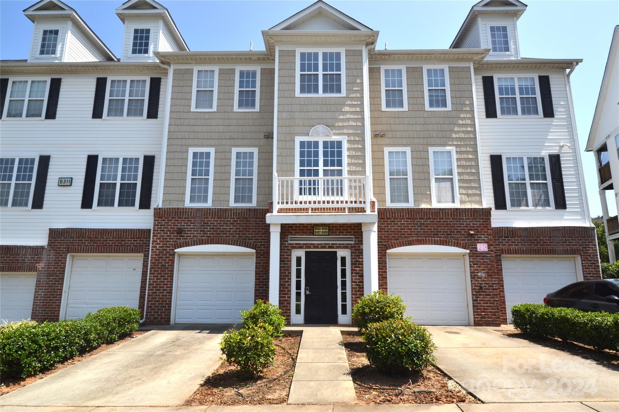 great floor plan with almost zero maintenance. An incredible opportunity to be within minutes of Uptown and University area. This three bedroom and three full bathroom condo will surely impress! Each bedroom offers its own private bathroom and walk-in closets. The master bedroom, as well as, an additional bedroom can be found on the main level. The main level is also accompanied by the living room, a sizable kitchen, dining area, and outdoor deck making it the vocal point for entertaining your guests. Down below, you will find an additional bedroom of significant size and space, the laundry room, garage, and another outdoor patio.