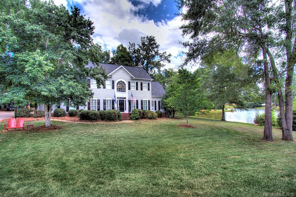 Waterfront home located in one of Rock Hill's premiere neighborhoods.  Traditional features include: heavy molding, hardwoods, formal rooms, family rm., sunroom/playroom, and front & rear stair cases.  Kitchen w/granite & stainless appliances; In-law/guest suite on 1st flr; Master BR, Bonus & 2 more BR's up. Amenities include pool, tennis, and clubhouse.