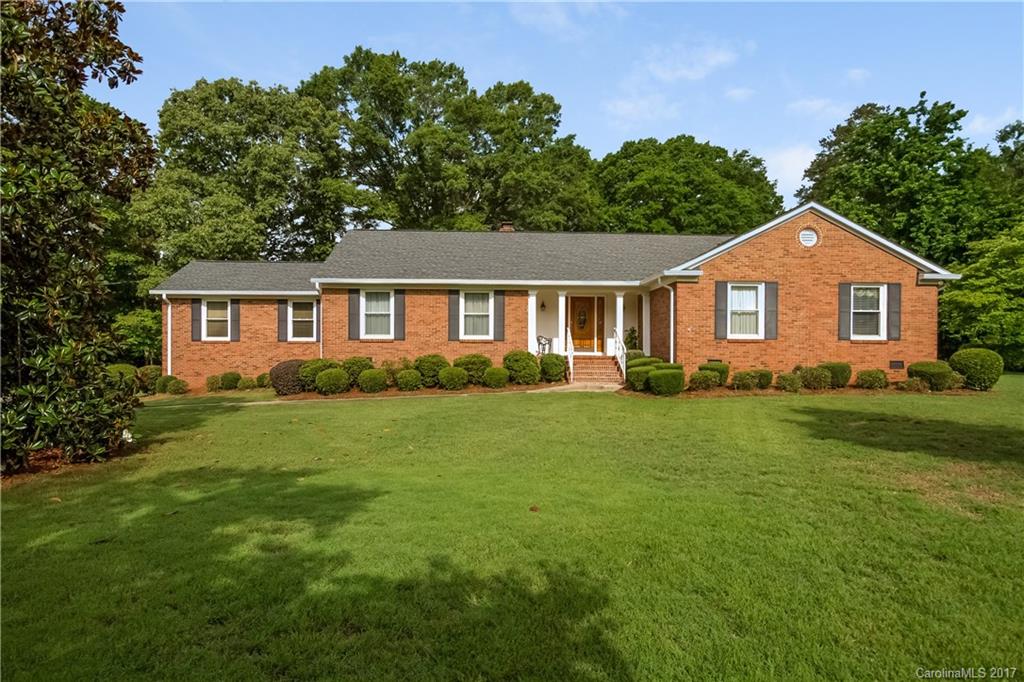 This well maintained, move-in ready four bedroom all brick ranch home sits on over an acre of level yard and outdoor living space.  Featuring a quiet neighborhood, sunroom, back-load oversized garage, and outdoor storage shed.  Fireplace can be gas or wood burning.  County taxes only, but near town with all the amenities and conveniences that Fort Mill has to offer.  Award winning Fort Mill schools and low taxes.