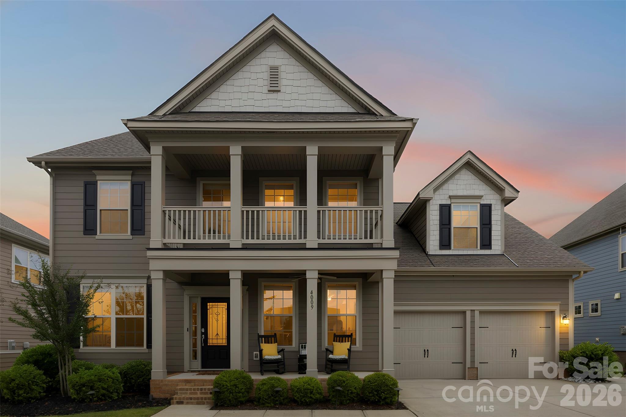 Southern charm, resort-style amenities, and thoughtful upgrades come together beautifully in this meticulously maintained home located in the highly desirable MillBridge community. With timeless curb appeal inspired by classic Southern architecture, this two-story home immediately stands out with its freshly painted exterior and warm, welcoming presence. Positioned directly across the street from a community pool, playground, and tennis courts, and just minutes from historic downtown Waxhaw, the location offers the perfect balance of lifestyle, convenience, and neighborhood charm.
Inside, beautiful flooring and an open-concept layout create an inviting atmosphere designed for both everyday living and entertaining. The beautifully finished kitchen features custom tile work, stainless steel appliances, staggered cabinetry, subway tile backsplash, and opens seamlessly into the spacious great room, creating the ideal space for gatherings and everyday living. A designer-inspired shiplap fireplace with a rich wood mantel creates the perfect blend of modern farmhouse charm and cozy elegance within the main living area. A dedicated office with French doors provides privacy and flexibility, while the large dining room offers an elegant setting for entertaining guests. Just off the garage, a private drop zone and mudroom combination adds convenience and organization to daily life.
The huge private bonus room over the garage offers additional flexibility for recreation, guests, or workspace, while the oversized primary suite is filled with natural light and features a garden tub, large walk-in shower, and beautiful finishes throughout.
This home has been exceptionally cared for and thoughtfully upgraded with trim lighting, accent lighting, a custom trash enclosure, upgraded shiplap fireplace, shiplap detailing on the island, fresh interior paint, and a fully painted exterior. The extended concrete patio and covered outdoor living area with ceiling fans create the perfect outdoor retreat for relaxing or entertaining. Additional features include a counter-depth Frigidaire Gallery refrigerator and ongoing termite and pest control maintenance for added peace of mind.
The main MillBridge amenity center just down the hill offers a lazy river, lap pools, fitness center, covered basketball court, movie theater, clubhouse coffee station overlooking the pool area, event spaces, and the community’s signature three-story slide. This is an opportunity to own a beautifully upgraded home in one of the area’s most amenity-rich communities.