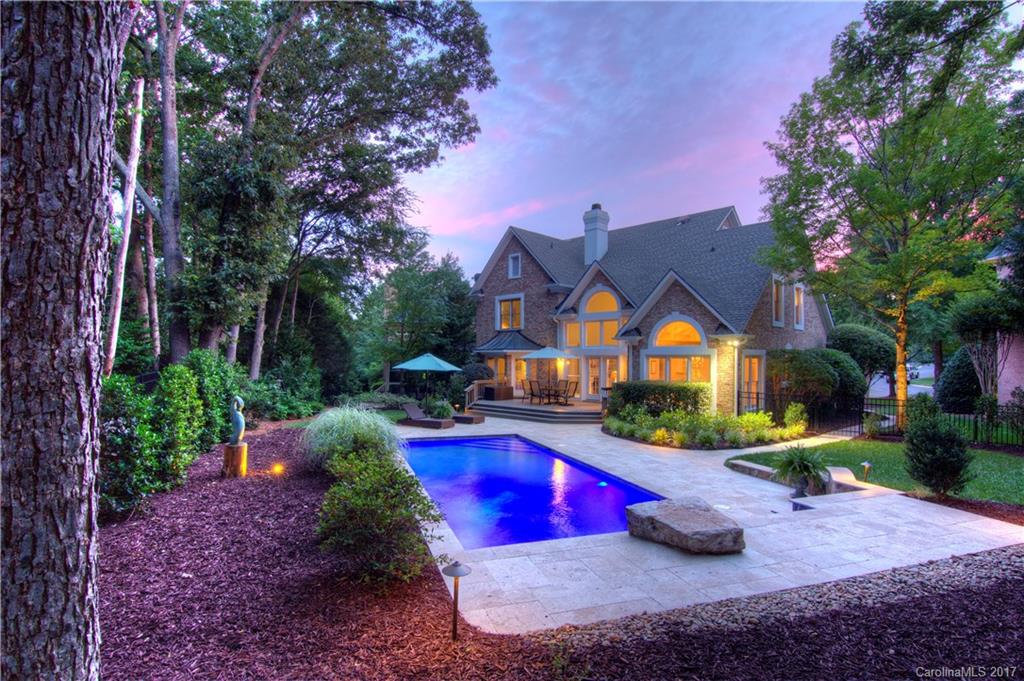 PRICE REDUCED TO SELL!  Gorgeous brick home in quite cul-de-sac, w/ breathtaking park-like backyard featuring Anthony Sylvan custom pool.  Perfect for entertaining... this sunny & bright 4 bedroom plus bonus home is the ideal floor plan for a family.  Enjoy the convenience of your master suite on the main level, overlooking the professionally landscaped & beautifully manicured yard from your private access to the deck.  Upstairs has stunning hardwoods throughout, Jack & Jill bath with granite.