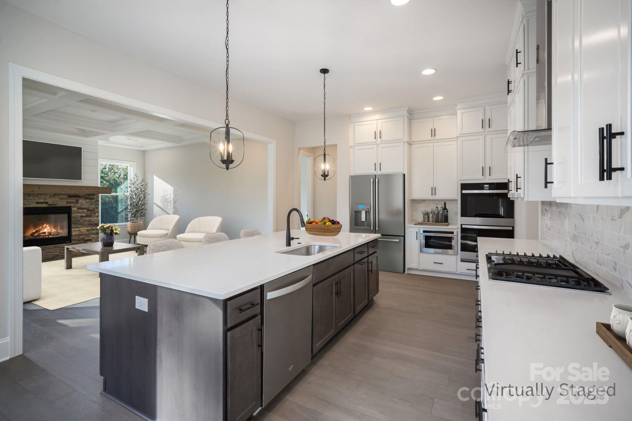 MOVE-IN READY, NEW CONSTRUCTION ON NEARLY 1.5 ACRES. Gorgeous ranch with upstairs retreat! Standard 10' ceilings on 1st floor, 8' height Interior doors! Epicurean Kitchen with quartz counter tops, double wall ovens, chimney vent hood, and extra-large island with quartz countertop opening to family room with gas fireplace with stone and shiplap surround & coffered ceiling, with covered deck off dining area & family room! Owners Suite has trey ceiling, large tiled walk-in shower, double bowl vanity with quartz countertops & large walk-in closet. Upstairs Retreat adds huge loft for gathering and entertainment, 4th BR, & 3rd Full Bath! All this plus plenty of room on the nearly 1.5 acre homesite for outdoor living and activity! You won't be disappointed in the style, craftsmanship & quality here! Encapsulated and conditioned crawl space! Other homesites and plans, ranging 2800-3700 sq ft, available!