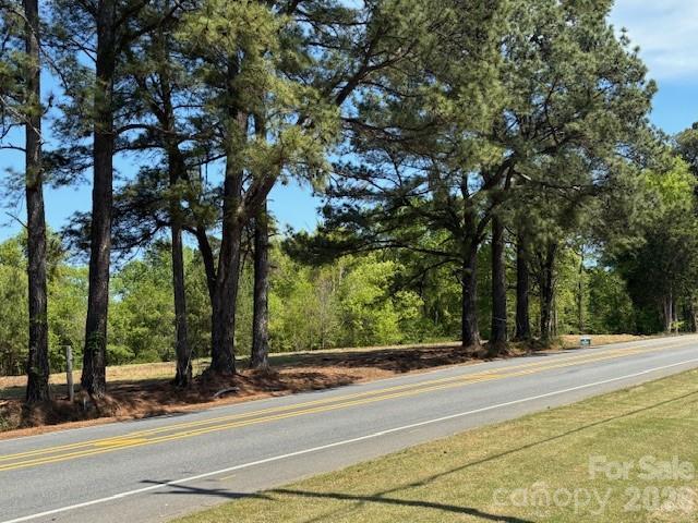 Lot 2 Ewart.  Prime Huntersville estate lot.  Bring your own builder.   Backs up to Northstone Country Club.   No HOA.   City water and sewer taps provided.  New park with walking trails, dog run and zipline planned nearby.  Convenient to Downtown Huntersville, Birkdale Village, Lake Norman, Uptown Charlotte and Charlotte-Douglas International Airport.
