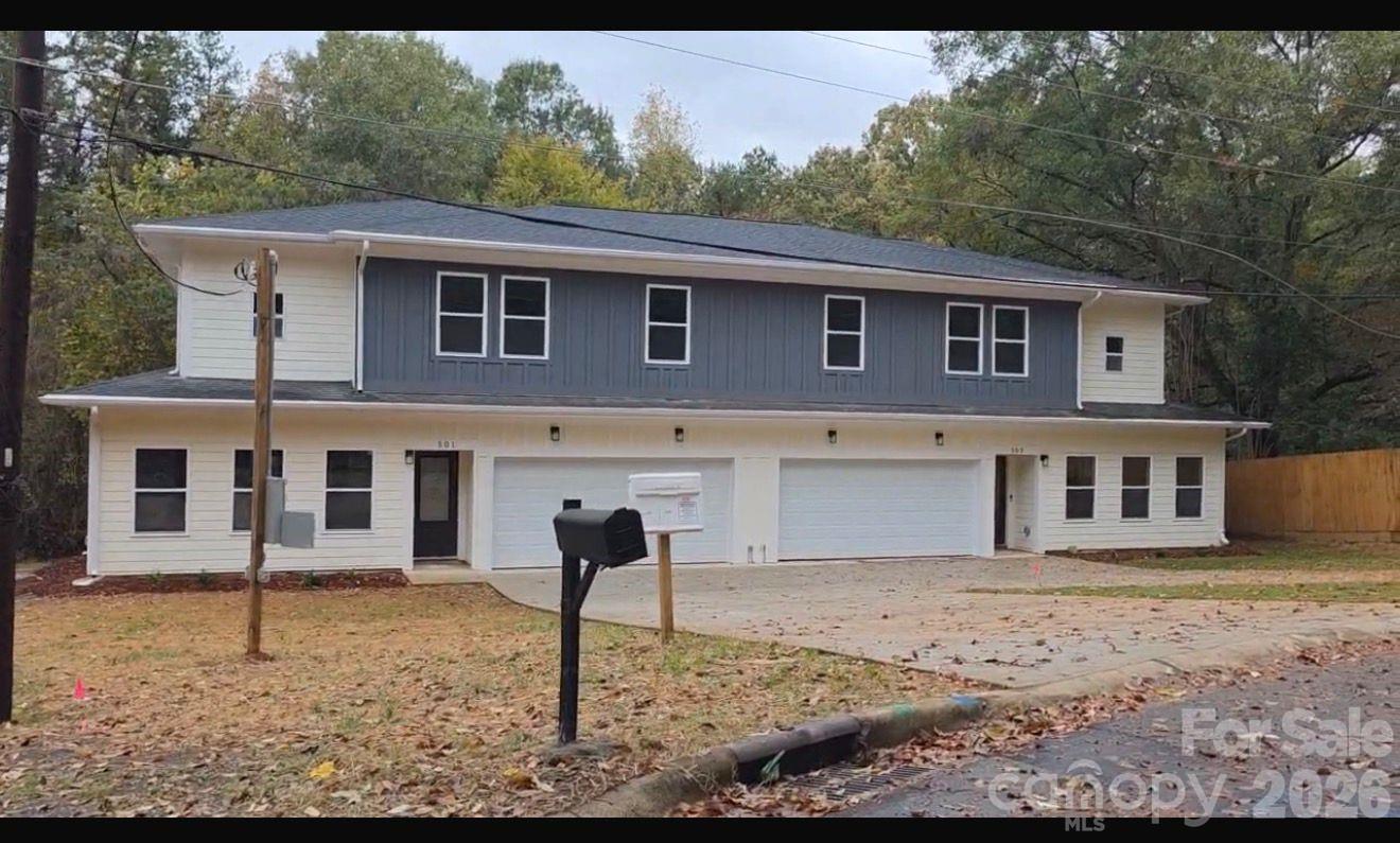 Brand-new duplex townhome near Hwy 77 and 485! Each end-unit offers 1,806 SQFT with an open layout. The chef-inspired kitchen includes 42" shaker cabinets, quartz countertops, stainless steel appliances, a large island, and ample storage—beautifully balancing style and function.premium LVP flooring. Features include Hardie siding, a 2-car garage per unit, and a concrete driveway. No HOA. Ideal for owner-occupants or investors. Minutes to South End, Uptown, CLT Airport, major highways, shopping, and dining. Move-in read. Upstairs, you'll find well-appointed bedrooms, generous closet space, and spa-style tiled showers in the bathrooms. The thoughtful floorplan provides privacy between rooms. Dont miss this Opportunity!