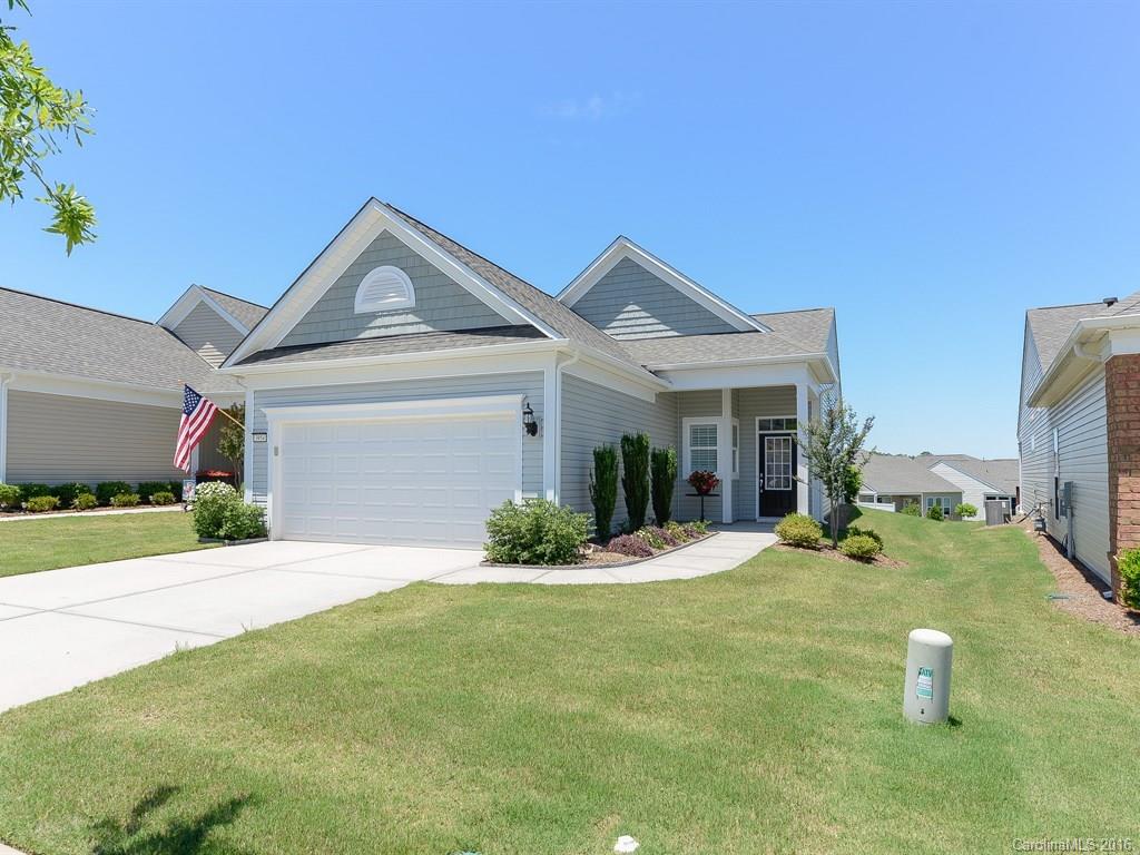 One of a kind upgraded Fox Run. Covered patio overlooks flat back yard and view of the trees. Small area off patio is fenced. HW floor in Great Room. Kitchen has granite counters, tile backsplash, gas range, Island, upgraded cabinets with crown, 18" tile floor. Recessed lighting in Kitchen and Great Room.  Plantation Shutters and custom paint. Comfort height double sink vanity and oversize shower in Master Bath. Energy efficient upgraded 14 SEER HVAC and radiant barrier in attic = low bills!