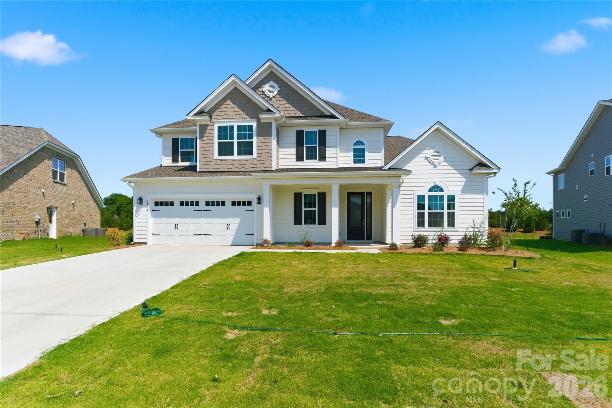 This beautifully upgraded 5-bedroom, 4-bathroom home with a media room offers approximately 3,600 square feet of living space on a level 0.30-acre lot in a highly desirable Harrisburg community.
The home features a grand two-story foyer, a formal dining room and an open-concept layout with abundant natural light. The gourmet kitchen includes quartz countertops and flows seamlessly into the spacious living room with built-in cabinets and a fireplace. Hardwood floors run throughout the main living areas.
The main level includes a large primary suite plus an additional bedroom and full bath—ideal for guests, multigenerational living, or a home office. Upstairs, you’ll find a dedicated media room, three spacious bedrooms, and two full bathrooms. Enjoy outdoor living on the covered back porch overlooking the large backyard, 

Residents enjoy excellent community amenities, including a swimming pool, playground, walking trails, and sidewalks. The home is also located just minutes from Stallings Road Park and close to top-rated schools, shopping, dining, and major highways with easy access to Charlotte,Concord and Huntersville.