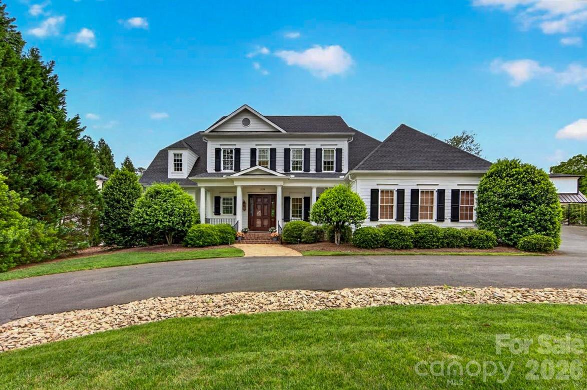 Stunning estate with five bedrooms, five full bathrooms & two powder rooms, located convenient to SouthPark, Park Road Shopping Center and Freedom Park. An entertainer’s dream with newly-renovated kitchen (with Monogram appliances) which seamlessly flows into large breakfast area, great room, family room and beautiful lanai - plenty of space to mix, mingle & enjoy the relaxing atmosphere of three fireplaces. New hardwoods and dimmable LED can lights throughout. Spa-like owners’ suite on the main floor with spacious bathroom, with heated floor, and large private sitting room that can double as home office/study. Nearly all secondary bedrooms on second floor have en suite bathrooms. Two large bonus rooms over the garage provide privacy and noise abatement from owners’ suite and downstairs activities. Gym equipment and matting conveys.