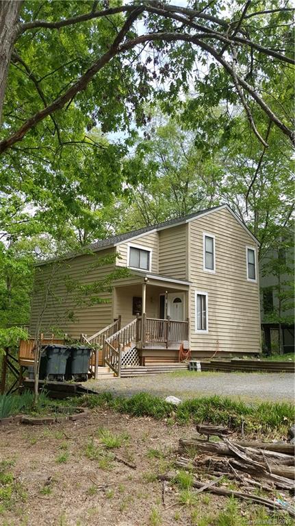 Nature surrounds this cozy cottage located in a lakefront community. French doors in 2 story living room open to partially covered back deck overlooking huge trees and a heavily wooded lot. High crawlspace area in back may offer options for additions and/or enclosure. New roof, HVAC and surrounding decking in 2011. New exterior paint. No HOAs. Coveted Fort Mill Schools. Enjoy all the amenities that living in Tega Cay has to offer - lake access, golf, tennis, playgrounds and walking trails.