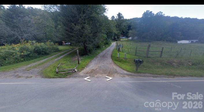 Here is your opportunity to own almost 9 acres in Barnardsville. This wooded lot is comprised of mature hardwoods, making it an ideal property for logging and earning some income right off the bat (owners have been verbally quoted a return of ~ $20-25,000). This open use property will allow you to put your own ideas in place, whatever those may be. The acreage has not been cleared or had a dwelling on it since the owner has owned it, preserving the land for future use. There is a deeded 10 foot Right of Way from approximately our company sign into the driveway on the right when facing the property from the road. Please park within the ROW. Please do not walk on to the property without an agent and appointment.