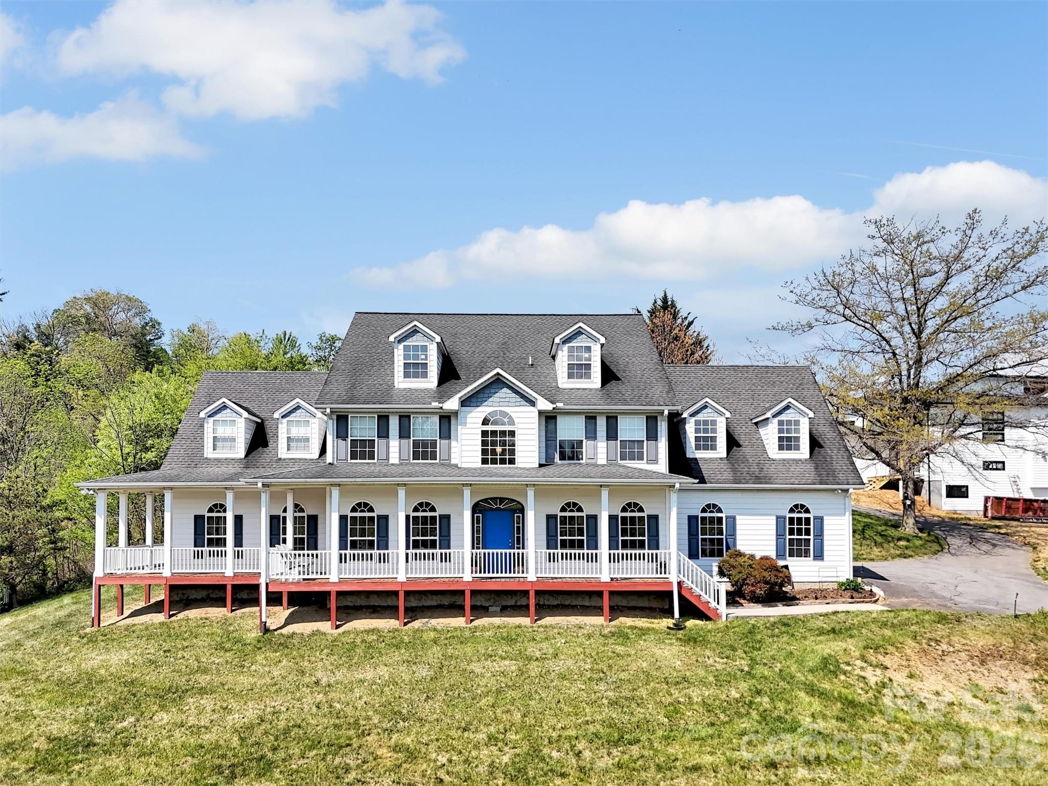 This is truly one of the most beautiful homes I’ve had the pleasure of bringing to market. Perfectly situated on a quiet cul-de-sac, this spacious residence offers stunning mountain views and timeless traditional styling throughout.

Step inside to a grand two-story entry hall that sets the tone for the home’s elegance. The main level features a private office, a formal dining room, and a well-appointed eat-in kitchen with granite countertops and a breakfast bar—perfect for both everyday living and entertaining.

Unwind in the expansive great room, complete with a cozy natural gas fireplace, or enjoy movie nights in the dedicated media room with an adjoining cocktail bar. Outdoor living is just as impressive, with wraparound decking designed to take full advantage of the breathtaking views.

The oversized primary suite is a true retreat, complemented by a luxurious primary bathroom you have to see to believe. Additional highlights include a two-car garage and a highly desirable location close to everything you need.