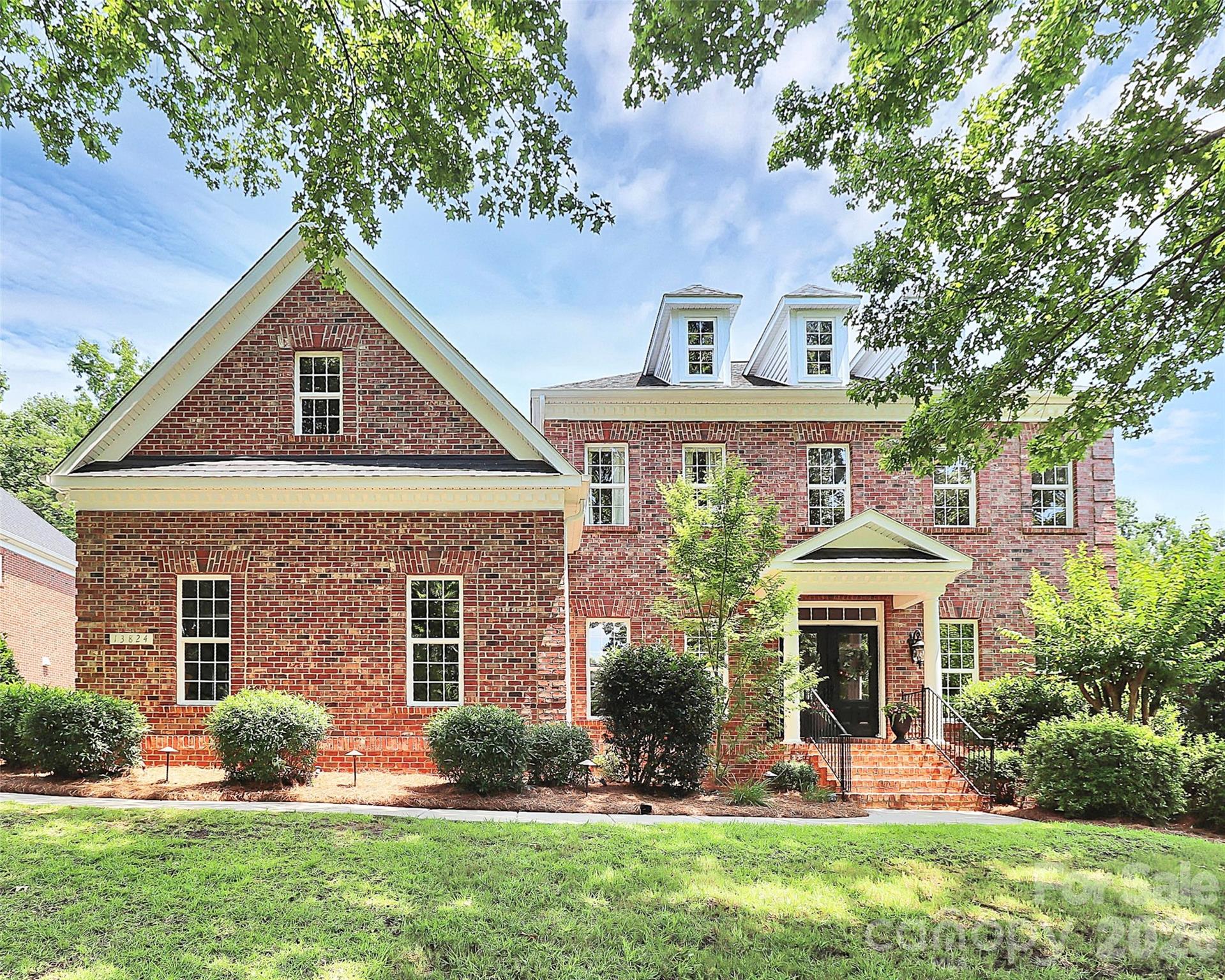 Discover refined living in this elegant full brick home on 3rd hole of the prestigious Jack Nicklaus designed golf course in the highly desirable Palisades! French doors w/beautifully landscaped yard create a grand first impression. HWs in main living areas, dining room, and office are off the foyer. Bright open floorplan features a well-appointed kitchen w/granite,tile backsplash, abundance of capinets w/pull-out shelves, double ovens, new cooktop & microwavepantry, abundant work & storage. Breakfast area opens to keeping room leading to large deck overlooking the private backyard. Bright open GR w/fireplace, soaring ceilings,built-ins, and surround sound Primary suite on main offers double tray ceiling, gorgeous en-suite w/soaking tub, walk-in shower, dual granite vanities, & 2 lg closets. Upstairs offers 3 beds & 2 full baths, spacious bonus room, & 2 large storage room that could be converted into extra heated aq. ft.. Oversize 3 car garage with storage area. The 12'X30' stamped concrete patio w/golf course views is perfect for relaxing and entertaining! Firepit near the patio.  Amenity rich Palisades offers large adult & children pools, playground, gym w/equipment, game courts, walking trails. Golf and tennis are available for a membership fee to the country club. Palisades is convenient to Charlotte, airport, medical facilities/hospital, shopping, dining, & gorgeous Lake Wylie! *Seller is a licensed Agent.