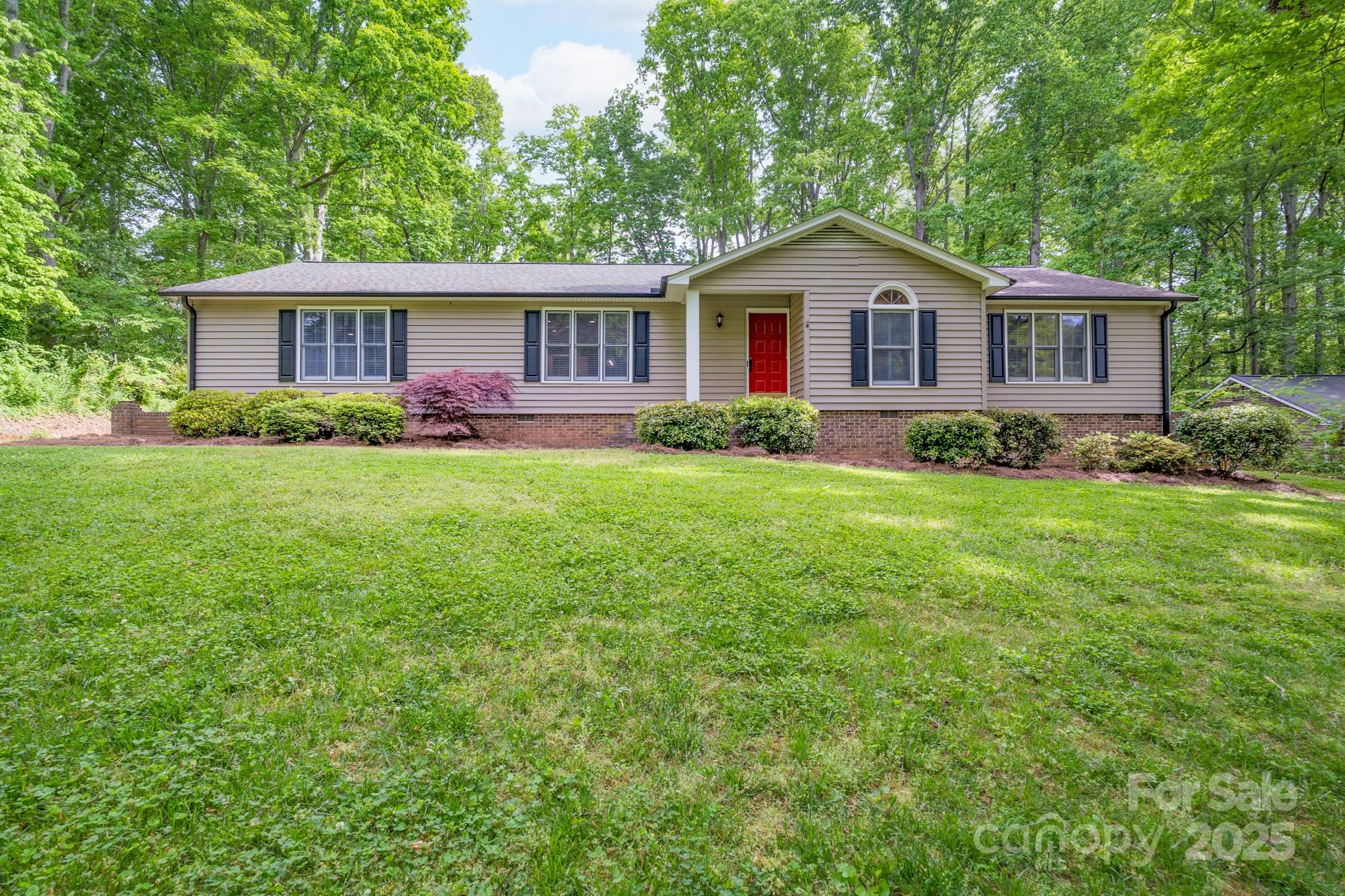 Located in the well-established Wood Forest subdivision, this four-bedroom home is a wonderful place that you do not want to miss the opportunity to see! Situated on a large, peaceful lot, this home features a family room with a beautiful brick gas log fireplace, a spacious dining and living room area, and an extremely large sunken den with new flooring that is perfect for entertaining.  The kitchen, with solid surface countertops and an island, includes an attached breakfast area.  Many windows have plantation shutters that add a special touch to this home! All of this and then add in a detached garage, new shed with electricity, updated electrical panels (2018), generator plug addition to panel, new plumbing main from meter to crawlspace, and a tankless water heater.  This great home in such a wonderful neighborhood is ready for new owners.  Come check it out and see f you are ready to call 4256 Wood Forest Drive your new home!