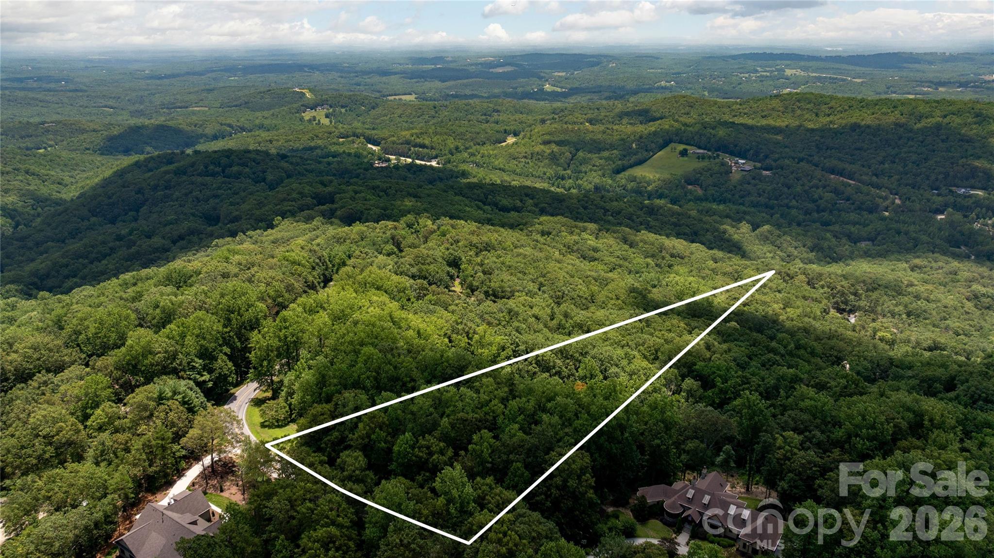 Escape to the mountains and bring your architectural vision to life on Lot 22, located inside the prestigious 24-hour guard-gated community of The Cliffs at Glassy. Situated on the rolling peaks of Glassy Mountain, this premier homesite offers the ultimate canvas for a private mountain retreat surrounded by mature hardwoods and serene nature. With membership options giving you access to an unparalleled mountaintop lifestyle featuring the Tom Jackson designed world-class golf course, a state-of-the-art wellness center and pool, lighted tennis and pickleball courts, miles of hiking trails, and the breathtaking Glassy Chapel. Conveniently located near the charming mountain towns of Landrum and Tryon, and an easy drive to downtown Greenville and Asheville. Also, less than an hour drive to Greenville-Spartanburg International and Asheville Regional Airports and less than a two hour drive to Charlotte Douglas International Airport.
Contact me today to explore the property and learn about purchasing a Cliffs Club Membership for full access to all seven Cliffs Communities!