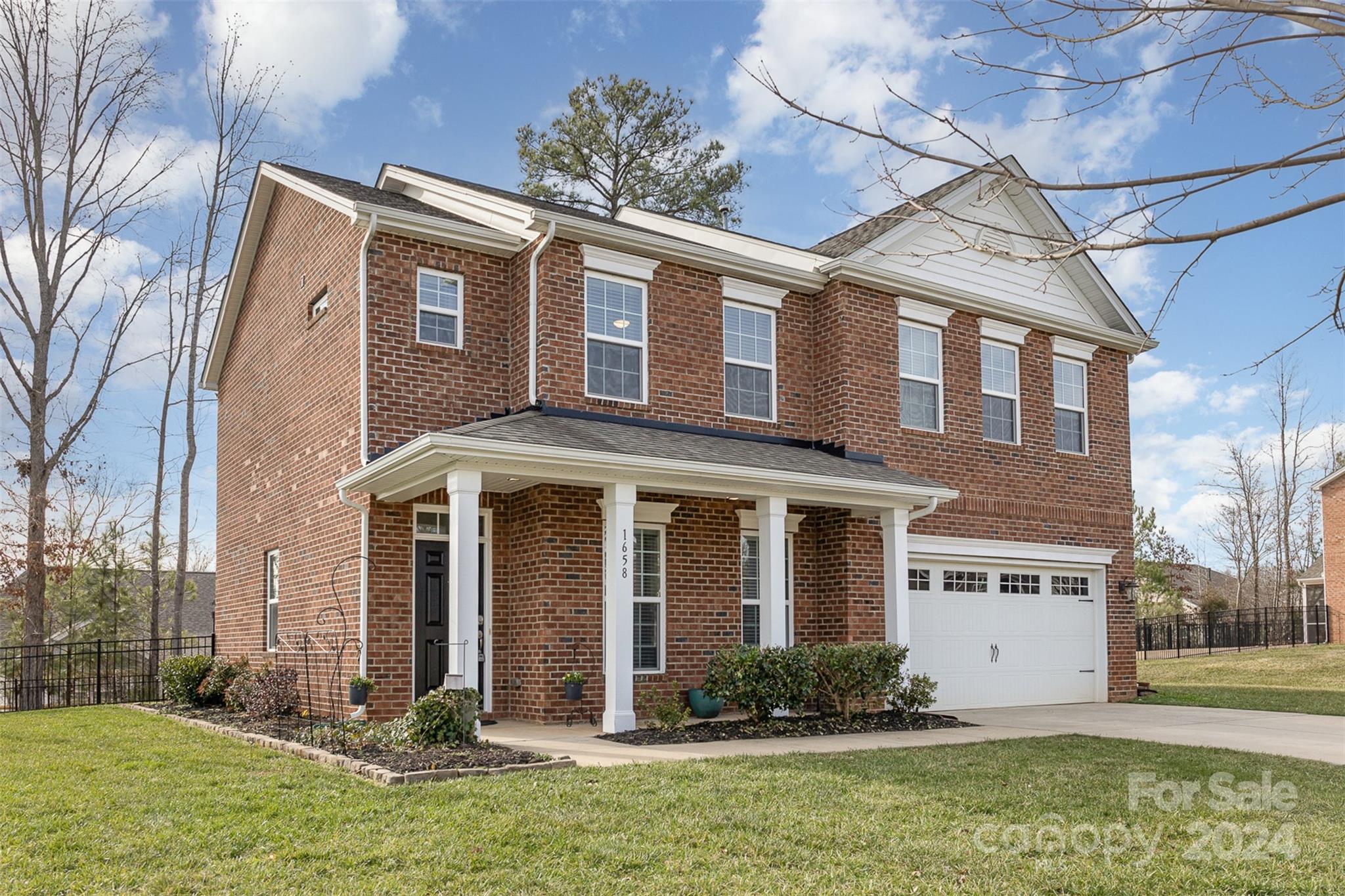 Stately full brick home tucked away in the back of the subdivision for additional privacy + less traffic, with endless updates found throughout! Featuring new laminate flooring on the steps + family room upstairs; new cabinets, flooring + paint in the laundry closet; a new dishwasher; + freshly painted lower level, family room upstairs, master bath + full bath, this home is move-in ready! The main level is ideal for entertaining with a formal dining room + open living room. Your beautiful kitchen includes SS appliances (that convey with the home), beautiful backsplash + cabinetry galore. Upstairs you'll find a family room as well as 3 spacious bedrooms, including the primary retreat, complete with tray ceilings, an enviable en-suite + a walk-in closet fit for royalty! The secondary bedrooms are sizable + share a full bath. Out back, you'll enjoy nights spent on your extended patio that overlooks your fully fenced in backyard + backs up to woods! The yard extends past fence.
