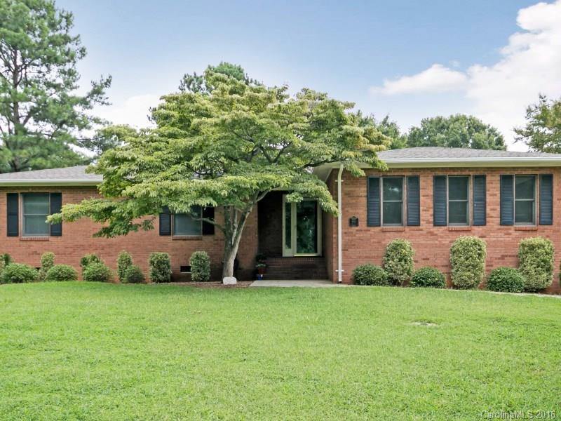 Wonderful updated all brick ranch home on large corner lot! Interior Freshly painted, NEW Carpet! Spacious family room w/ masonry fireplace & ceiling fan. Great eat-in Kitchen w/ tile floor, good cabinet space & access to family room. Master BDRM features his/her closets, ceiling fan & full private bath. Nice secondary BDRMs w/ ceiling fans. Large patio to enjoy outdoors! Over half an acre lot! Quiet Neighborhood. Convenient location close to shopping, parks, walking trails & the highway!