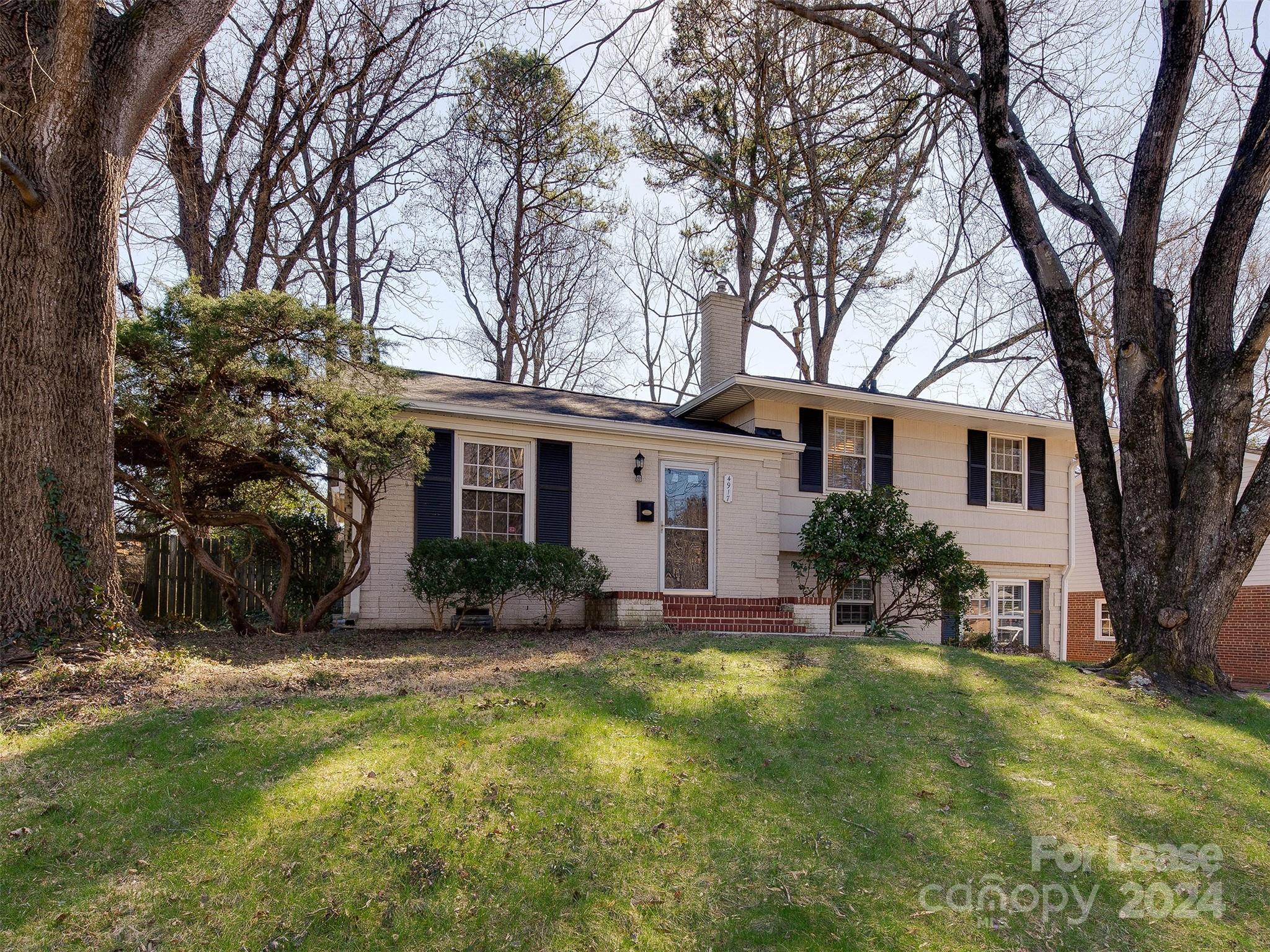 Charming and hard to find 5 bedroom home in Madison Park!  This stunning home has it all!  Walking into the living room, you are greeted by glowing original hardwood floors and lots of natural light.  Walking further takes you to the eat-in kitchen with new stainless steel appliances and plenty of cabinet space.  The back door leads you to a screened in porch overlooking the private and fenced in back yard that is just great for entertaining. Upstairs are three bedrooms and a shared bathroom. Downstairs you will find 2 bedrooms and a bath as well as the laundry room that includes the washer and dryer. Enjoy living in such an amazing location that is just minutes to Park Rd Shopping Center, all the great restaurants and bars on Montford, less than 10 min to Southpark Mall, 6 minutes to I-77 and 15 minutes to SouthEnd and Uptown.  Check out the schools! Take a look today!