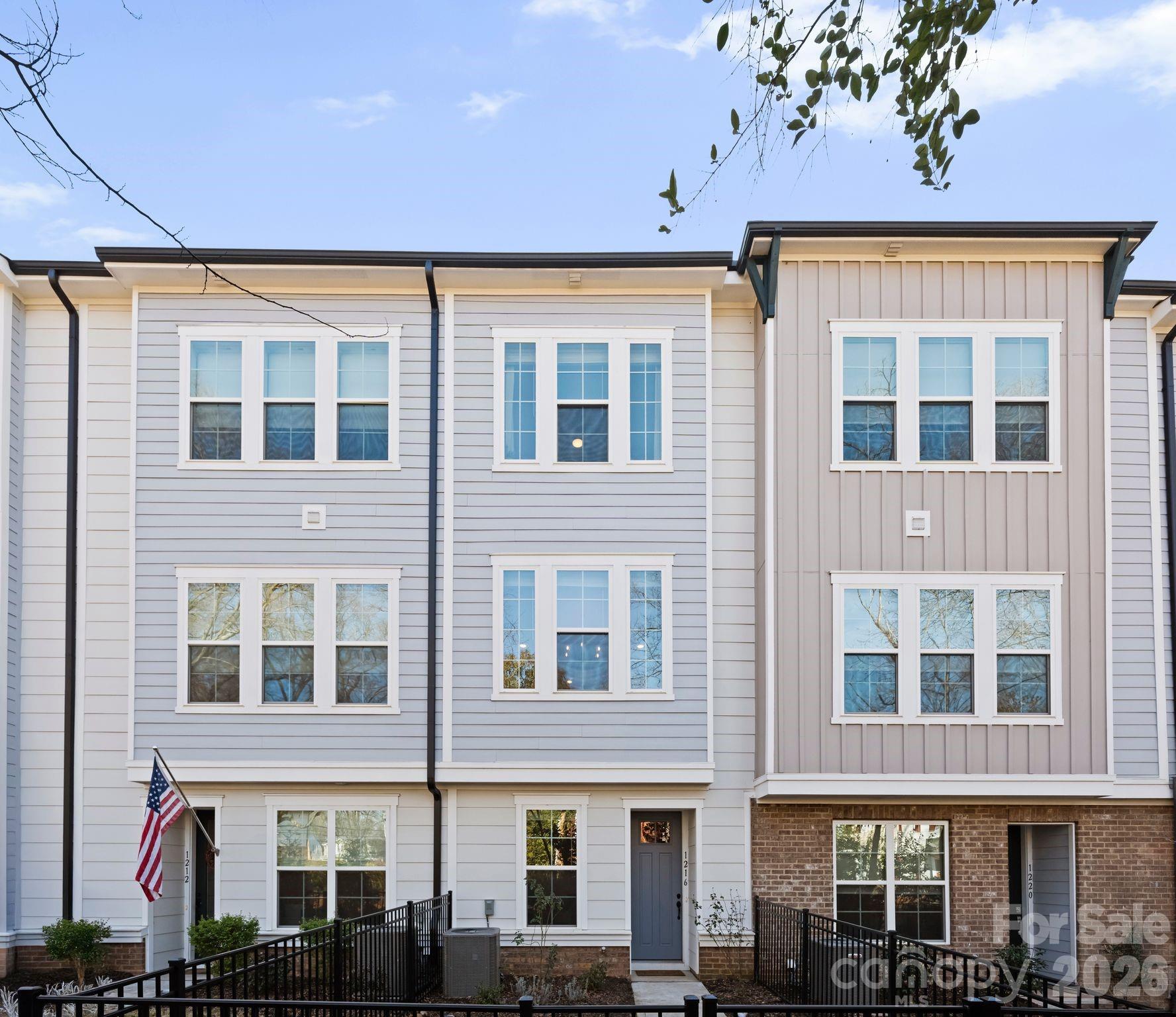 This 3 story, David Weekly townhome, is nestled in the impeccable location, just off Craig Ave. in the heart of Cotswold!  Step inside this open layout with 10' soaring ceilings on main living floor, modern design, oversized windows, and gorgeous finishes throughout.  The kitchen is stunning, featuring Greyhound and white cabinets with soft close drawers, a large island, gleaming stainless steel appliances and gorgeous Carrara Breve quartz countertops.  Natural light shines on your open-concept living spaces through energy-efficient windows, highlighting your interior design style. The third floor is highlighted by an impressive Owner’s Retreat offering an en-suite bathroom complete with quartz countertops - dual vanity, large tile shower, plus a pair of walk-in closets. The guest suite also includes it's own private bathroom, walk-in closet.  Main level Flex Space/Office is the perfect setting to work from home. Fenced in front yard provides a hyper unique feature not found with many townhome community options. Oversized single car garage.  Enjoy the best that Cotswold and Oakhurst have to offer, in this turn key, like new townhome!