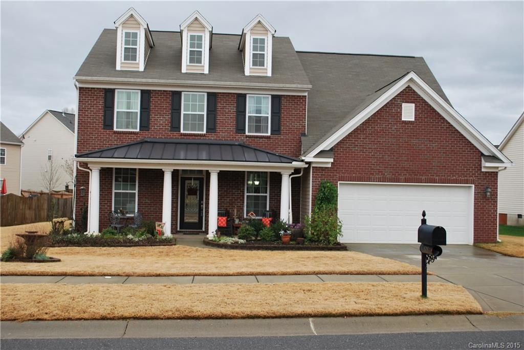 Master down, hardwoods floors throughout, golf course like lawn and beautifully appointed features. First floor living areas boast versatile floor plan, custom fixtures, and bright open spaces. Kitchen features granite countertops, tile splash and ss appliances, leading to quaint screened-in porch. Two story great room is spacious and charming with a cozy fireplace. New carpet in bedrooms! Community is a dream with pool, dog parks, creek & walking trails.