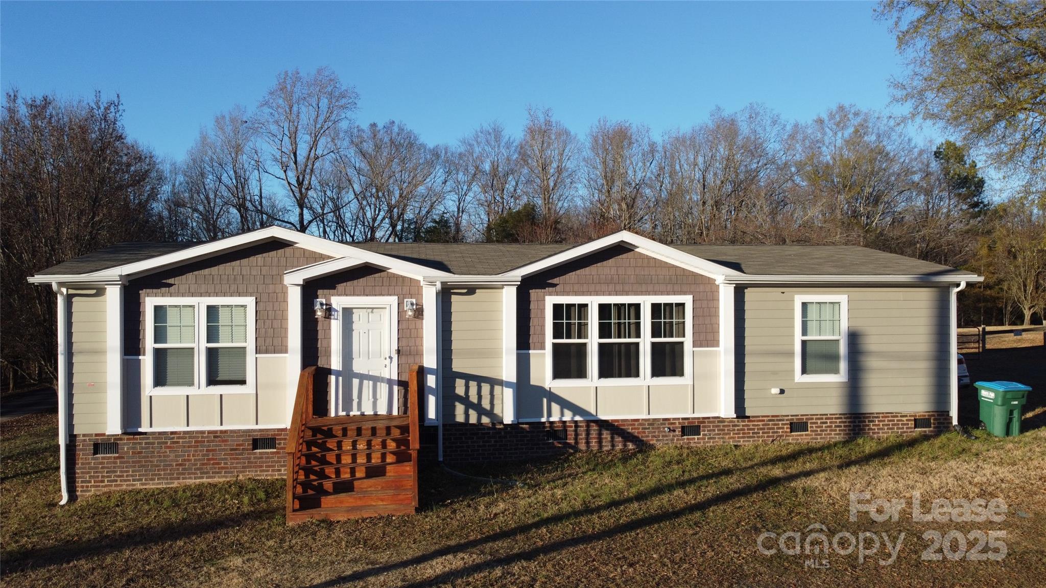 Built in 2021, this charming 3-bedroom, 2-bath home offers modern comfort just minutes from historic downtown Waxhaw. With 1,528 sq ft of living space, the open floor plan features split bedrooms for privacy and a seamless flow between the kitchen, dining, and living areas.
The primary suite includes a walk-in closet and a spa-style bath with double vanities, soaking tub, and walk-in shower. The kitchen is equipped with a center island, barn-door pantry, and ample cabinetry, perfect for everyday living and entertaining. A dedicated utility room with storage/workspace adds convenience.
Enjoy outdoor living on the rear deck overlooking the large backyard, ideal for gatherings or quiet evenings. With no HOA restrictions, tenants have flexibility to enjoy the property to its fullest.
Conveniently located near shopping, schools, medical offices, and the hospital, this home combines small-town charm with modern amenities.