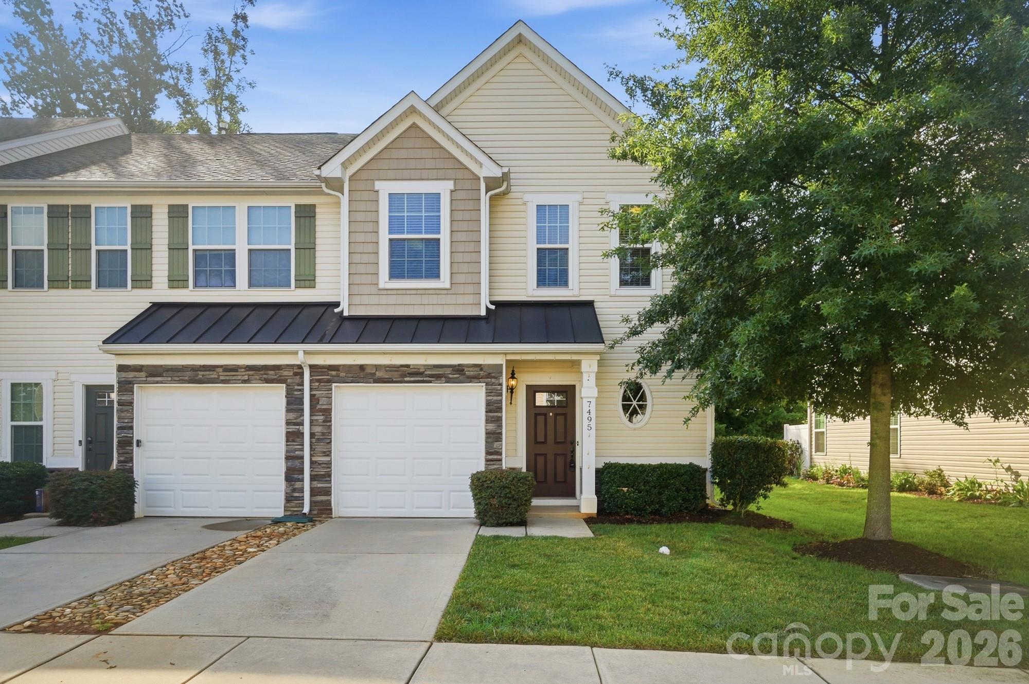 Located in a desirable gated community with a beautiful community pool, this charming two-story home offers the perfect blend of comfort, style, and privacy.  Inside, you'll find 3 spacious bedrooms, including a private primary suite with an en-suite bath featuring a large tub/shower combination. The beautifully appointed kitchen is the heart of the home, showcasing granite countertops, a gas range, stainless steel appliances, a refrigerator that conveys, oversized 42-inch cabinets, and a breakfast bar suitable for stools —perfect for casual meals or entertaining guests.
Step outside to enjoy the spacious patio and grassy backyard that backs to mature woods, providing a peaceful, private setting. An attached one-car garage and additional driveway parking add everyday convenience.  This home offers everything you need in a welcoming community with great amenities—ready for you to move in and enjoy.
