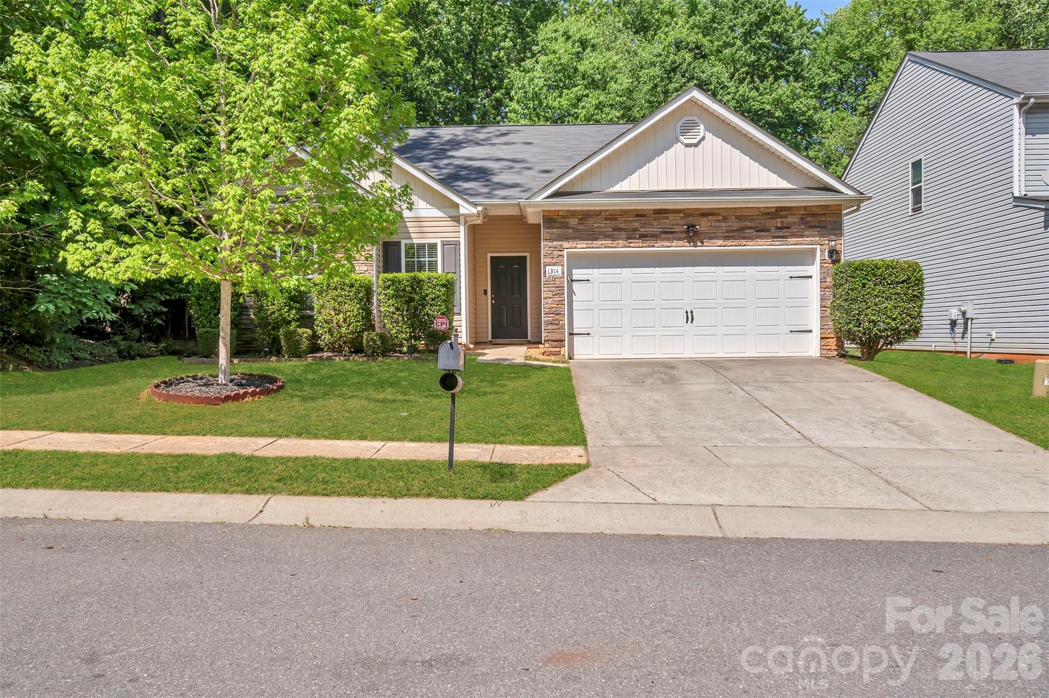Welcome home to this charming and well-maintained ranch offering an open spacious floor plan with vaulted ceilings throughout. Home is tucked away at the end of the street with rear yard backing up to woods.   Conveniently located with quick access to the University area, I-85 and I-485.