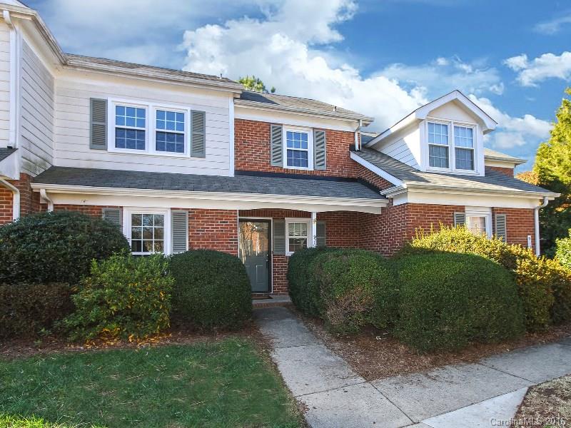Amazing Location!  South CLT off Park Rd!  NEW WINDOWS!  2 Bed/2.5 Bath Townhome Style Condo!  Cozy up to the Beautiful Brick Fireplace.  You will love the bamboo wood floors in the Family Room and Dining (new 2015).  White Kitchen with SS Appliances and breakfast area.  The Master BRM has vaulted ceilings, on-suite bath with double vanities and large Walk-in Closet.  Second Bed has attached bath.  HVAC - 2012.  Washer & Dryer - 2014.  Bathrooms has fresh Paint.  Fridge, Washer & Dryer Convey!